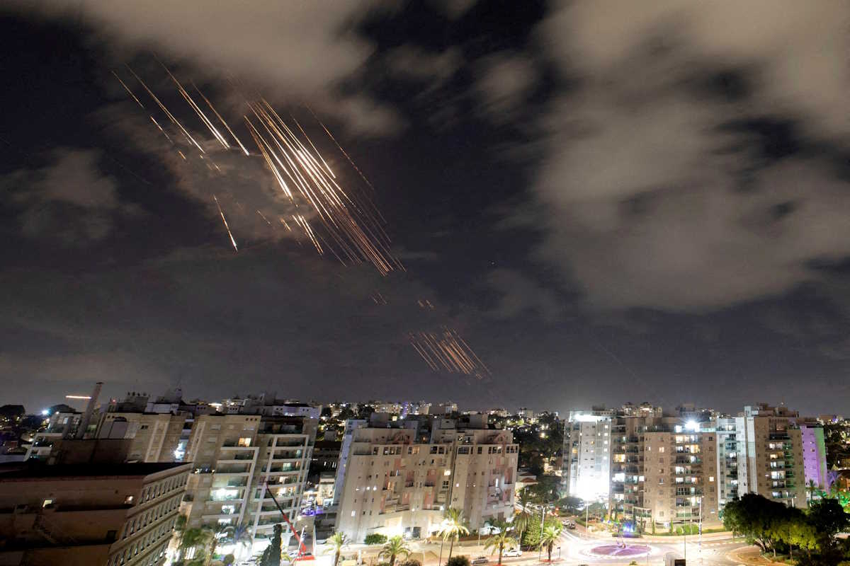 FILE PHOTO: Israel's Iron Dome anti-missile system intercepts rockets after Iran fired a salvo of ballistic missiles, as seen from Ashkelon, Israel, October 1, 2024 REUTERS