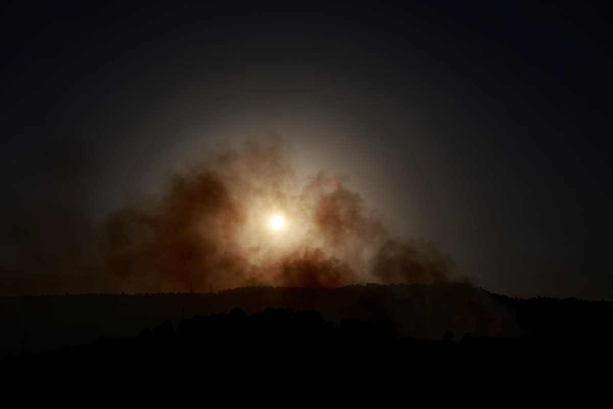 Smoke rises, amid ongoing cross-border hostilities between Hezbollah and Israeli forces, in Kiryat Shmona, northern Israel, October 9, 2024. REUTERS