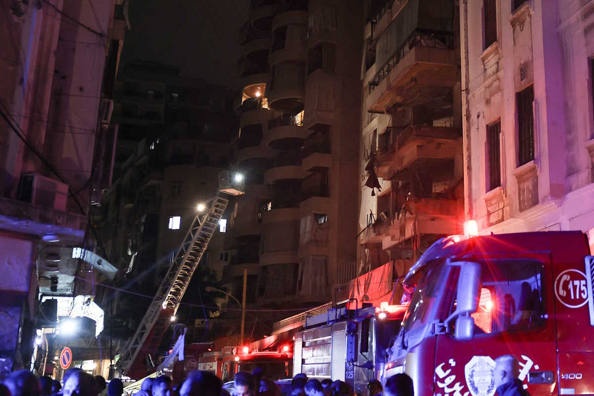 Rescue vehicles are seen at the site of an Israeli air strike, amid ongoing hostilities between Hezbollah and Israeli forces, in Ras Al- Nabaa, in Beirut, Lebanon, October 10, 2024. REUTERS