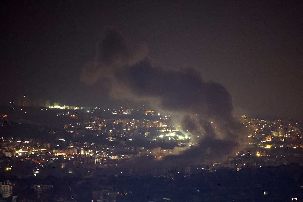 Smoke billows over Beirut's southern suburbs after a strike, amid ongoing hostilities between Hezbollah and Israeli forces, as seen from Sin El Fil, Lebanon, October 5, 2024. REUTERS
