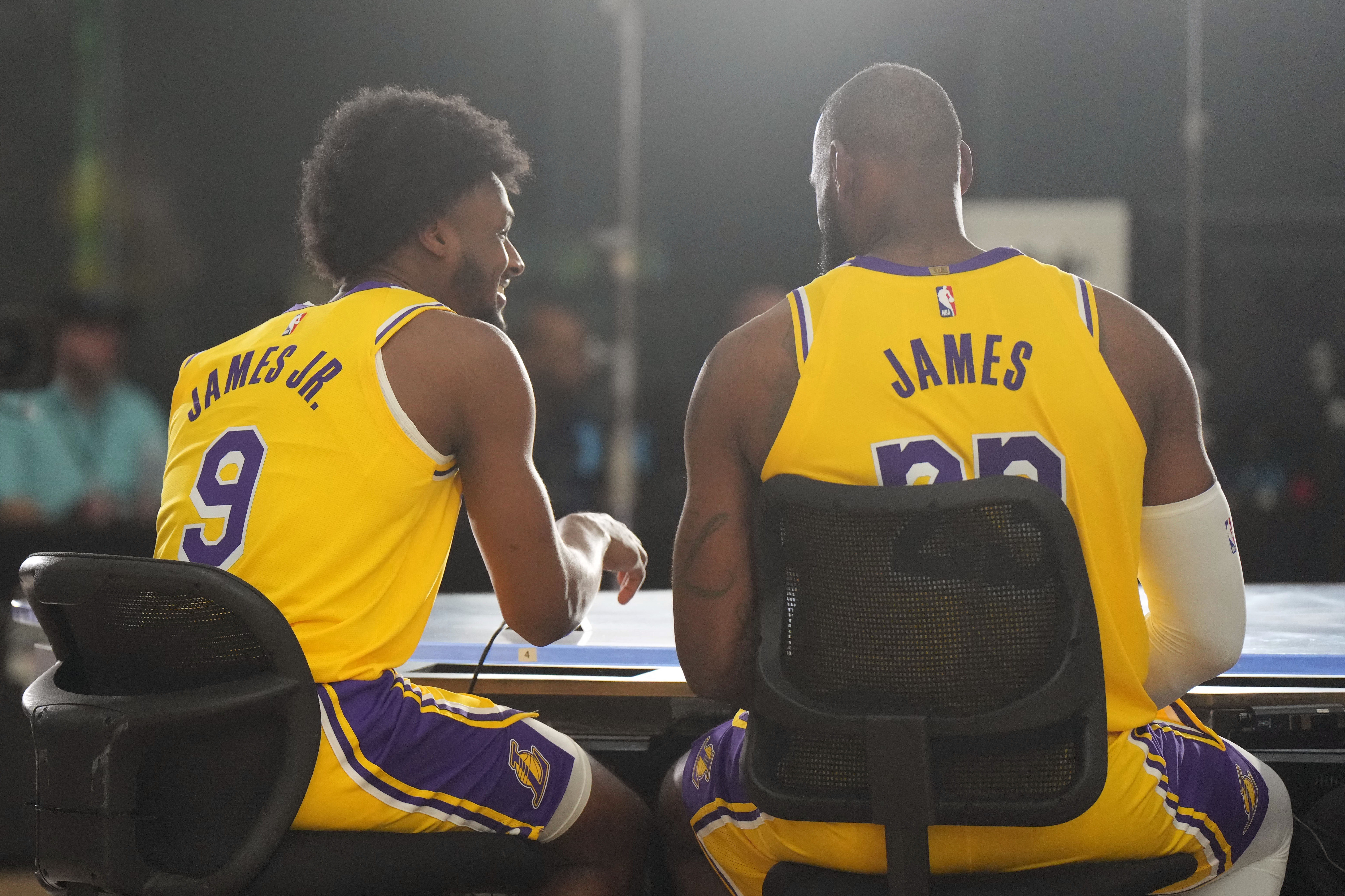 Sep 30, 2024; El Segundo, CA, USA; Los Angeles Lakers forward LeBron James (23) with son Bronny James (9) during media day at the UCLA Health Training Center. Mandatory Credit: Kirby Lee-Imagn Images