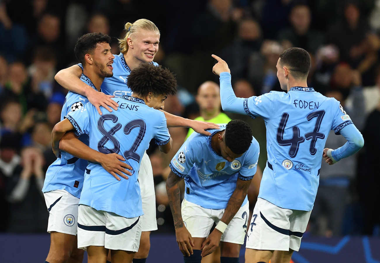 Soccer Football - Champions League - Manchester City v Sparta Prague - Etihad Stadium, Manchester, Britain - October 23, 2024 Manchester City's Erling Haaland celebrates scoring their fourth goal with teammates REUTERS