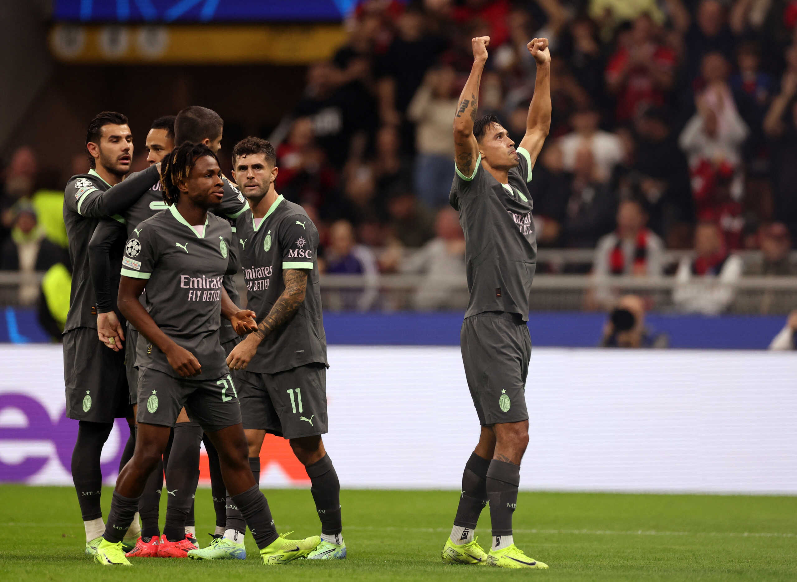 Soccer Football - Champions League - AC Milan v Club Brugge - San Siro, Milan, Italy - October 22, 2024 AC Milan's Tijjani Reijnders celebrates scoring their second goal REUTERS