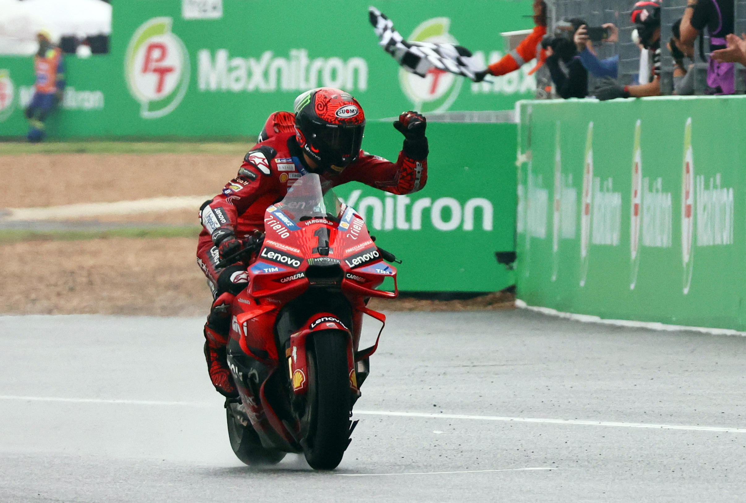 MotoGP - Thailand Grand Prix - Chang International Circuit, Buriram, Thailand - October 27, 2024 Ducati Lenovo Team's Francesco Bagnaia celebrates after crossing the line to win the MotoGP REUTERS