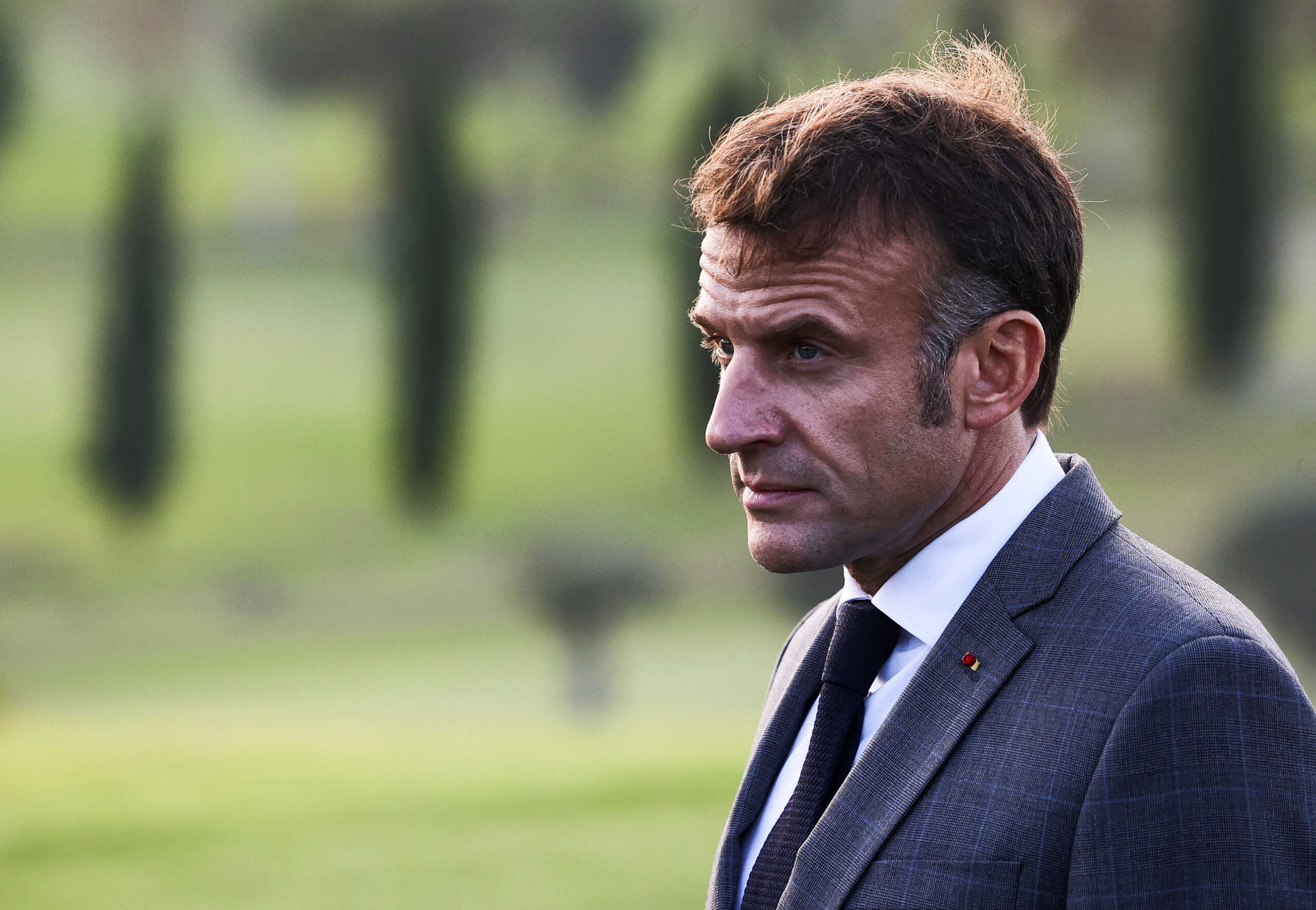 France's President Emmanuel Macron looks on after a family photo on the day of the Euro-Mediterranean Summit (EU-MED9) in a resort near Paphos, Cyprus, October 11, 2024. REUTERS