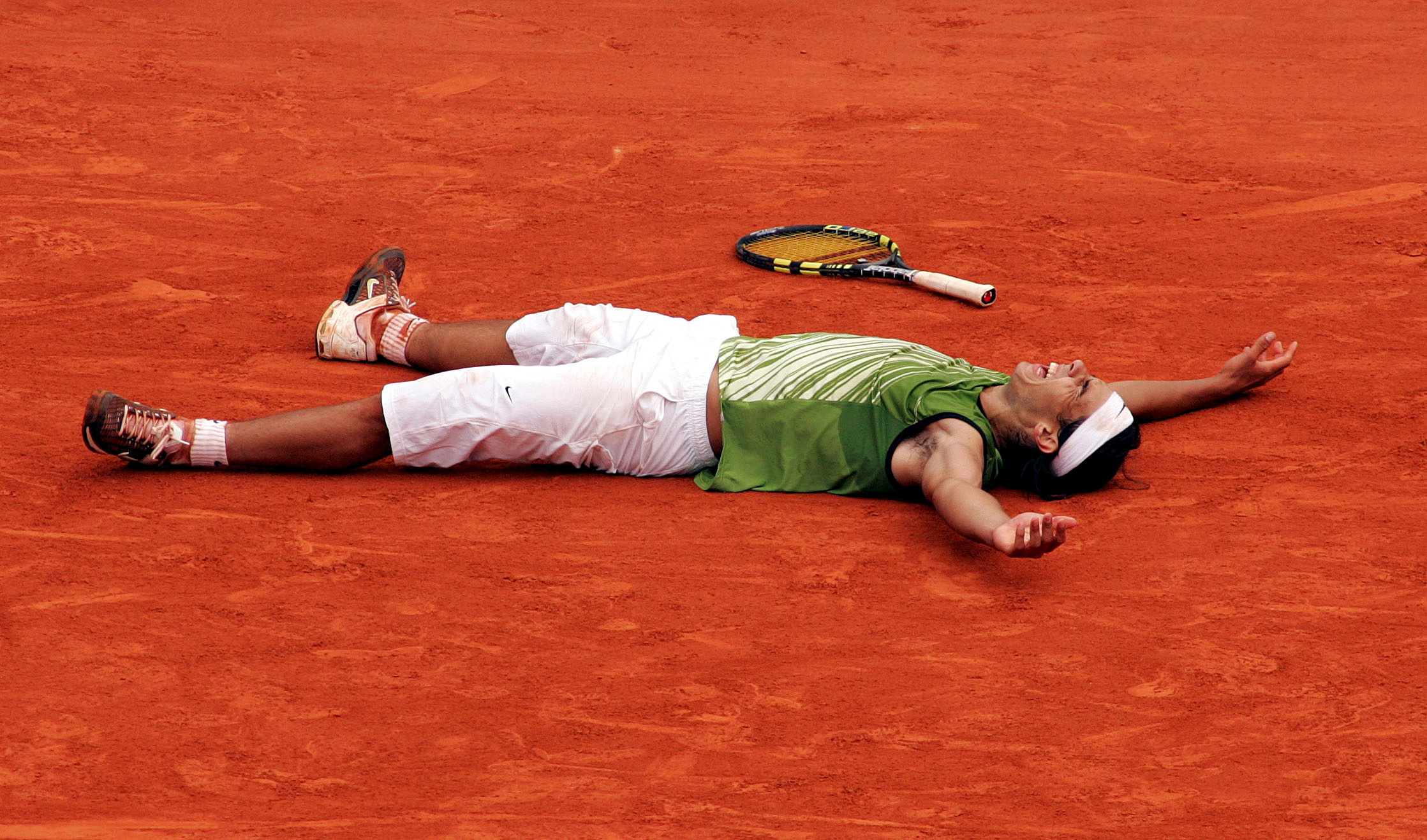 FILE PHOTO: Tennis - French Open - Stade Roland Garros - June 5, 2005     Spain's Rafael Nadal celebrates winning the French open  Action Images via Reuters