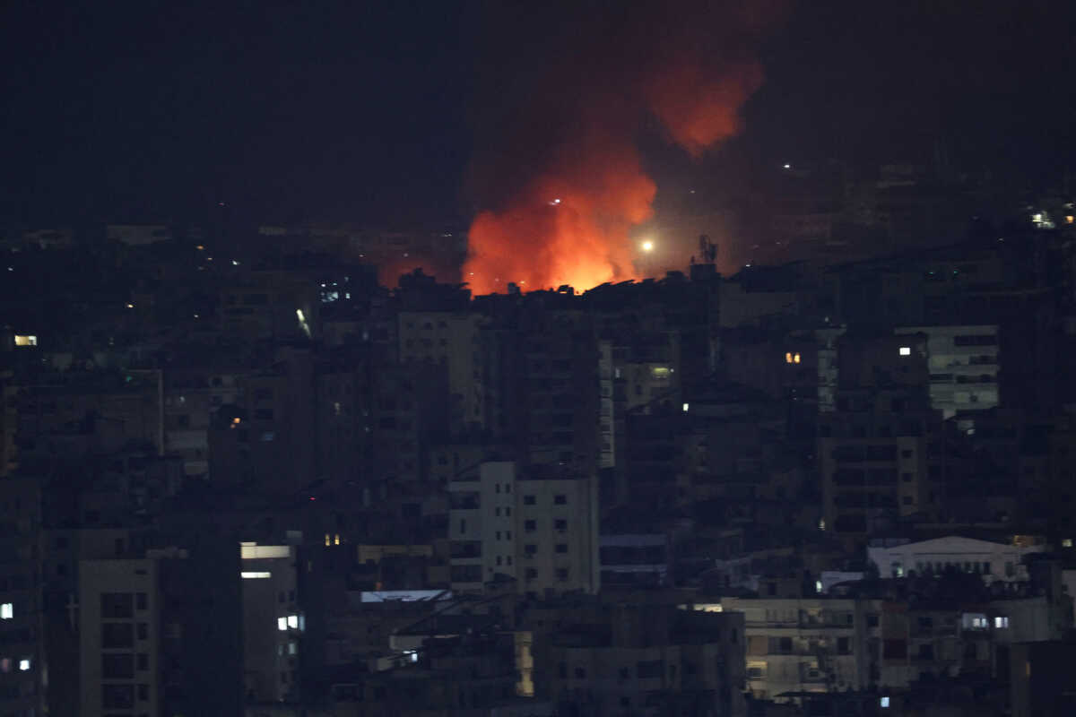 Smoke and flames rise over Beirut's southern suburbs after a strike, amid ongoing hostilities between Hezbollah and Israeli forces, as seen from Sin El Fil, Lebanon, October 6, 2024. REUTERS