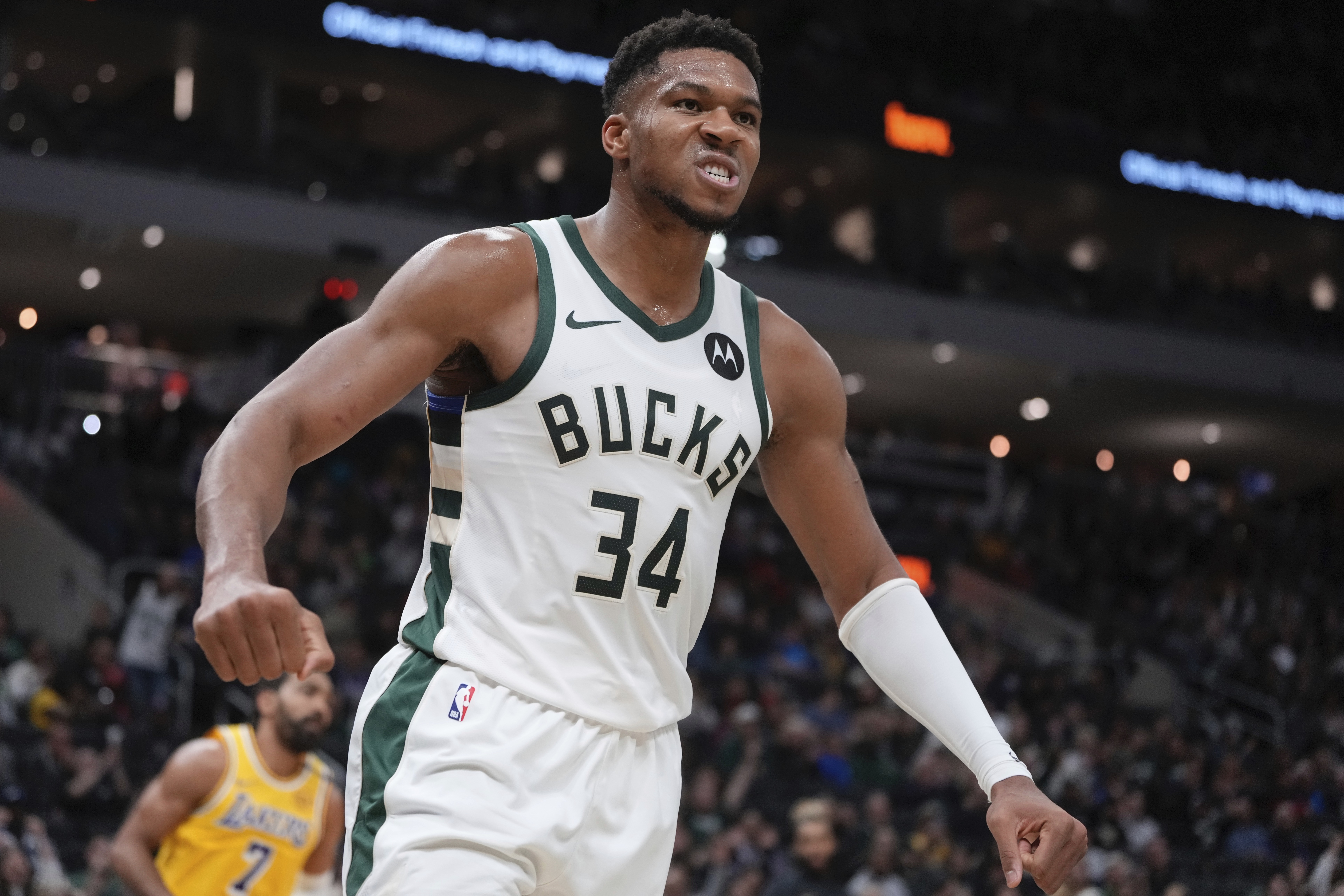 Milwaukee Bucks' Giannis Antetokounmpo reacts after a dunk during the first half of an NBA preseason basketball game Thursday, Oct. 10, 2024, in Milwaukee. (AP Photo