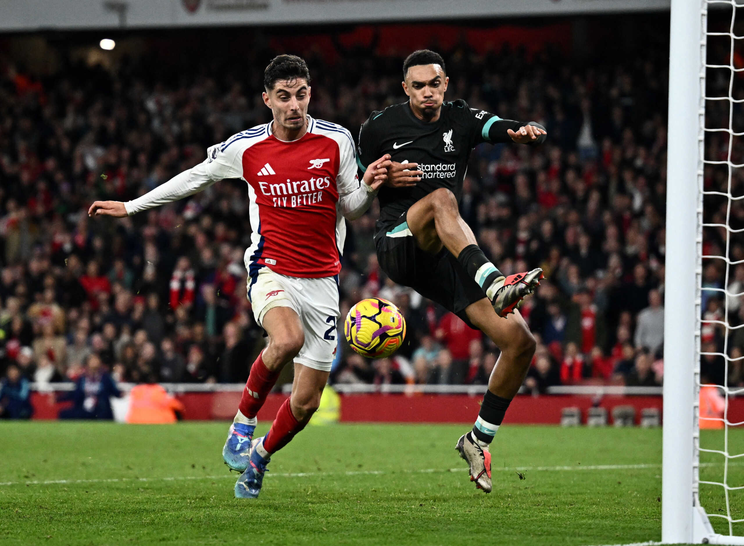 Soccer Football - Premier League - Arsenal v Liverpool - Emirates Stadium, London, Britain - October 27, 2024 Arsenal's Kai Havertz in action with Liverpool's Trent Alexander-Arnold REUTERS