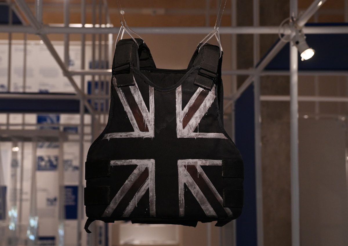 epa08759613 A customised stab-proof vest, designed by street artist Banksy and worn by British musician Stormzy during his performance at the Glastonbury Festival in 2019, is on display during a preview of the 'Beazley Designs of the Year' exhibition at the Design Museum in London, Britain, 20 October 2020.  EPA