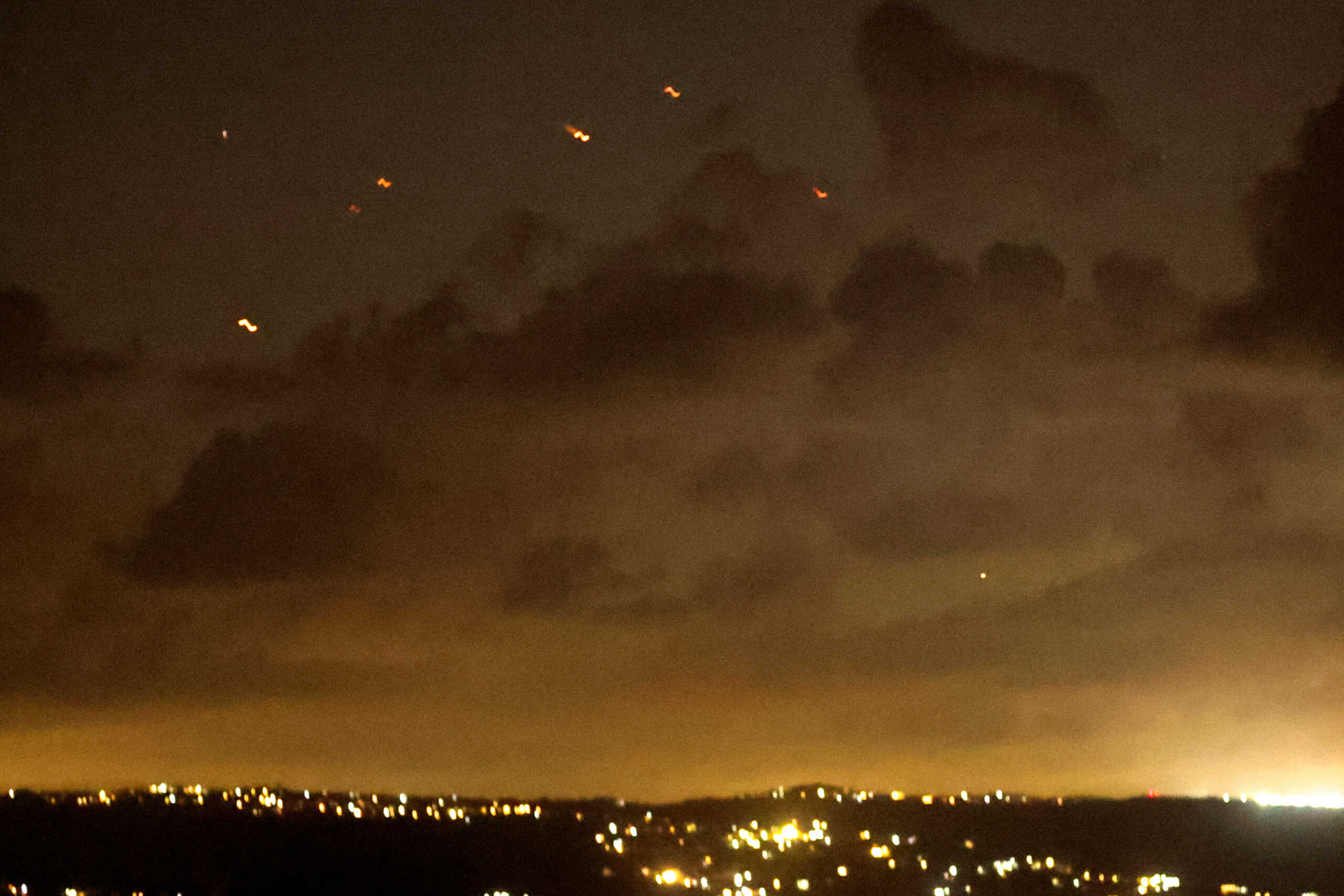 Projectiles fly in the sky after Iran fired a salvo of ballistic missiles at Israel amid ongoing hostilities between Hezbollah and Israeli forces, as seen from Tyre,  southern Lebanon October 1, 2024. REUTERS