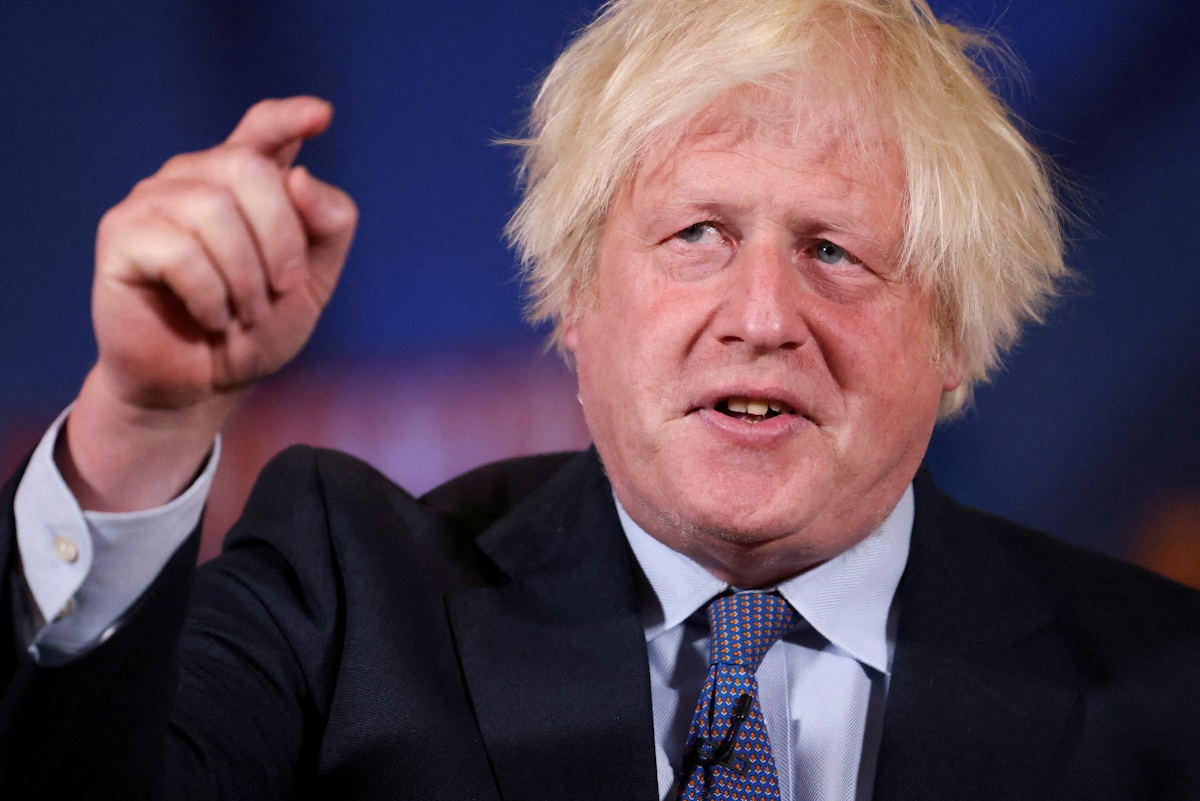 FILE PHOTO: Former British Prime Minister Boris Johnson gestures as he endorses British Prime Minister Rishi Sunak at a campaign event during a Conservative general election campaign event in London, Britain, July 2, 2024. REUTERS