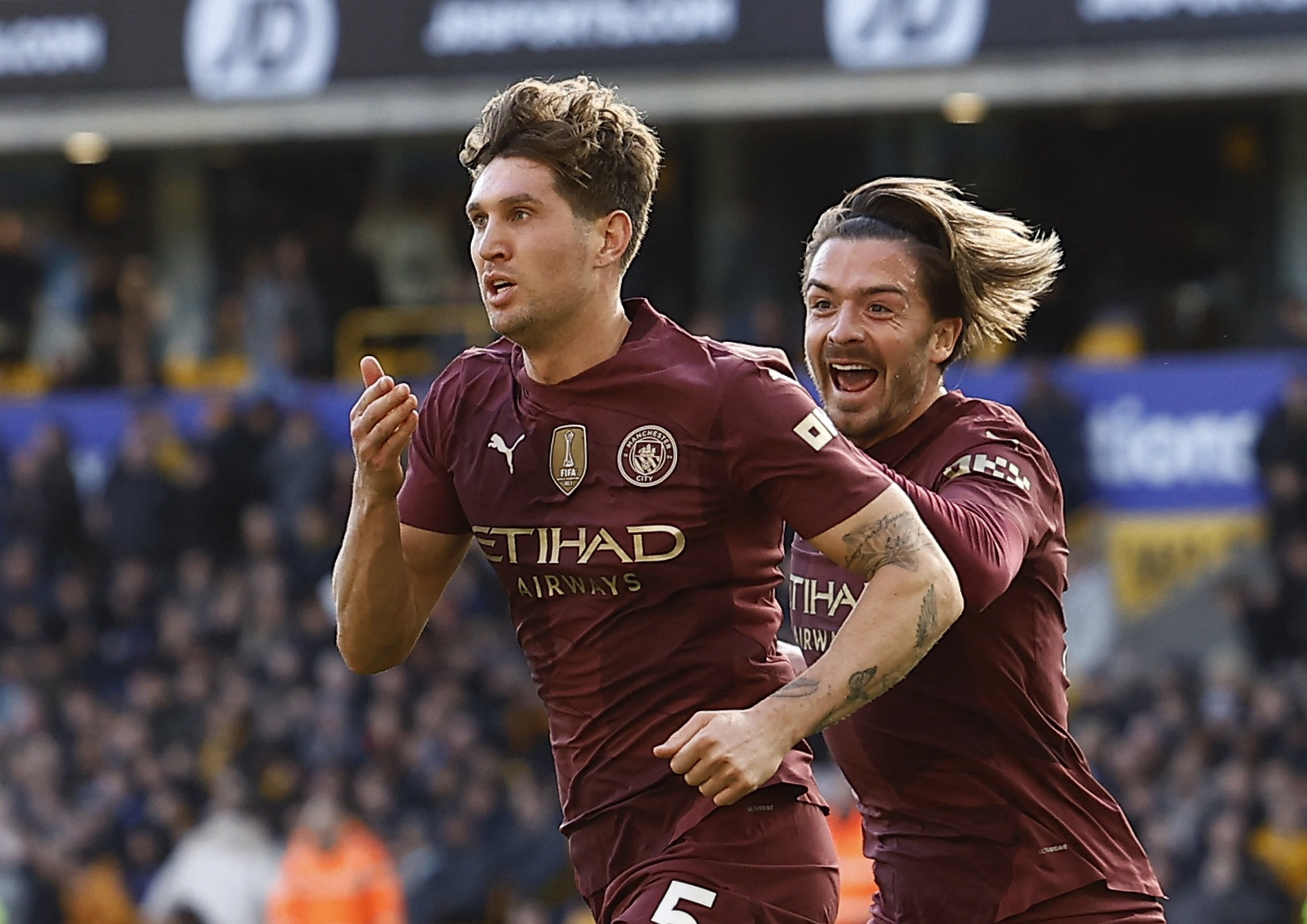 Soccer Football - Premier League - Wolverhampton Wanderers v Manchester City - Molineux Stadium, Wolverhampton, Britain - October 20, 2024 Manchester City's John Stones celebrates scoring their second goal with Jack Grealish Action Images via Reuters