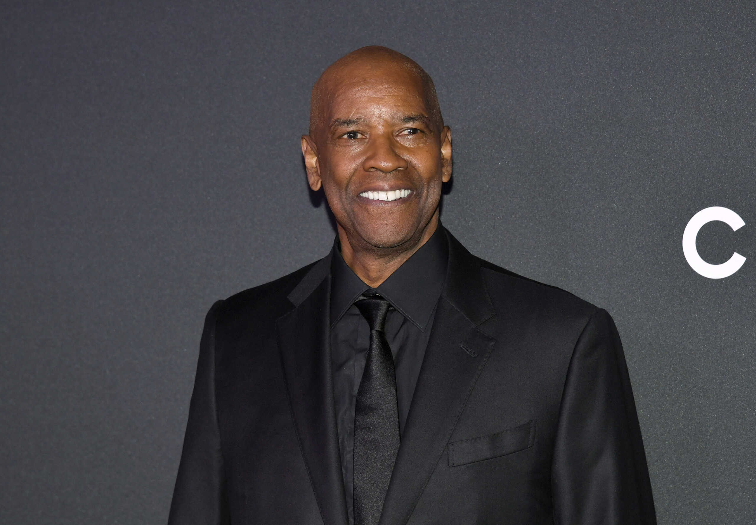 Denzel Washington attends the 16th annual Museum of Modern Art Film Benefit, presented by Chanel, honoring Samuel L. Jackson on Wednesday, Oct. 23, 2024, in New York. (Photo by Evan Agostini