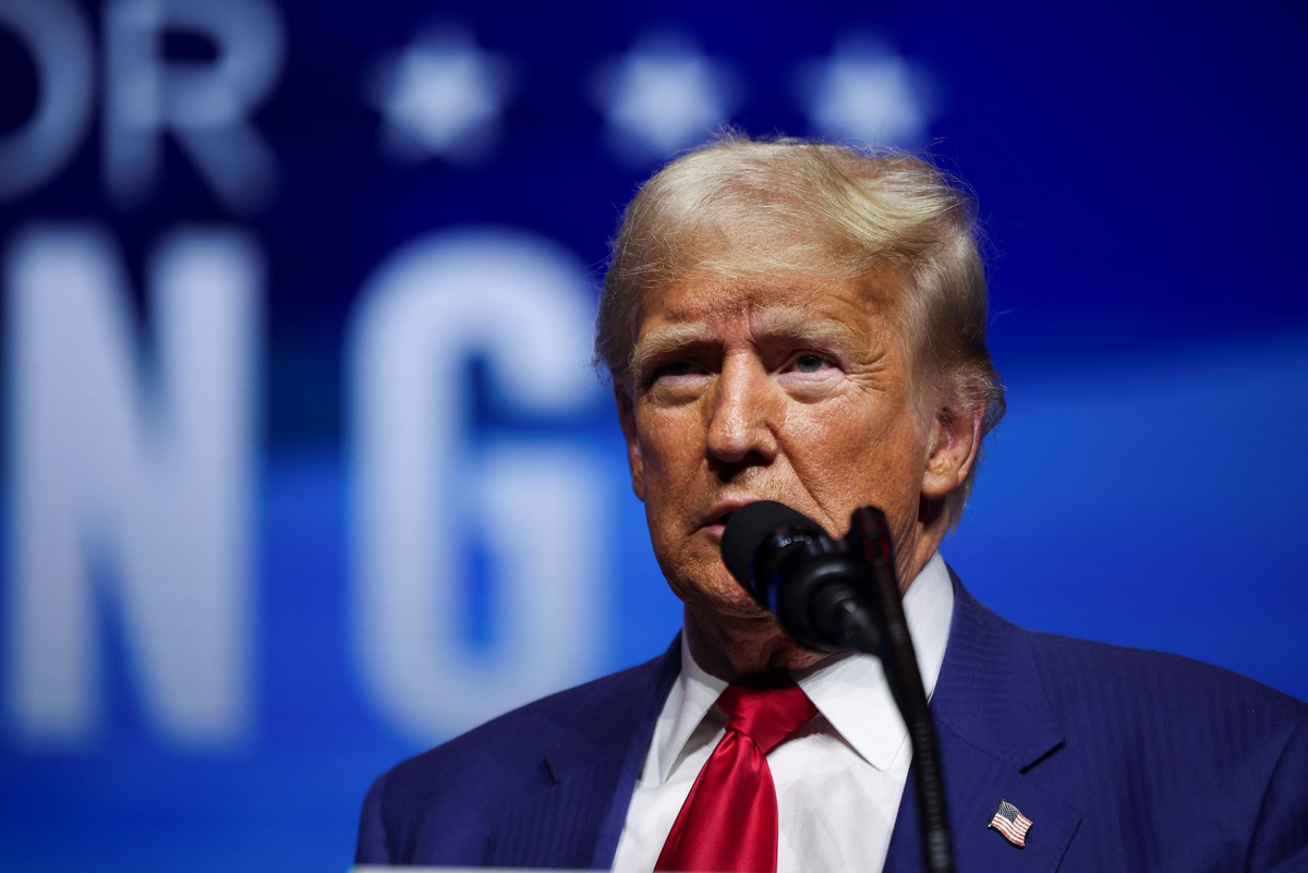 Republican presidential nominee and former U.S. President Donald Trump speaks at a campaign event sponsored by conservative group Turning Point Action, in Las Vegas, Nevada, U.S. October 24, 2024.  REUTERS