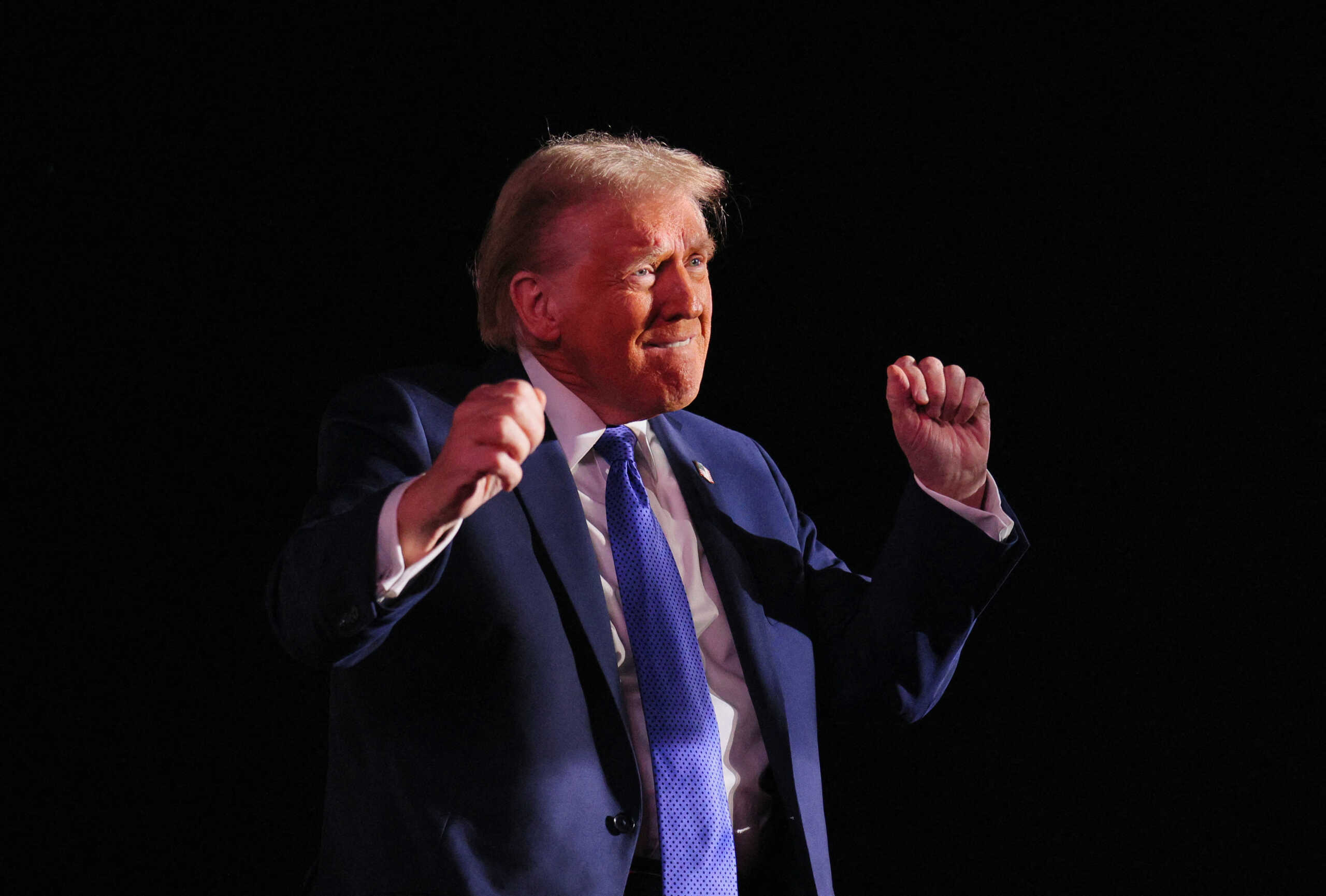Republican presidential nominee and former U.S. President Donald Trump dances at the end of his Make America Great Again Rally in Latrobe, Pennsylvania, U.S. October 19, 2024. REUTERS