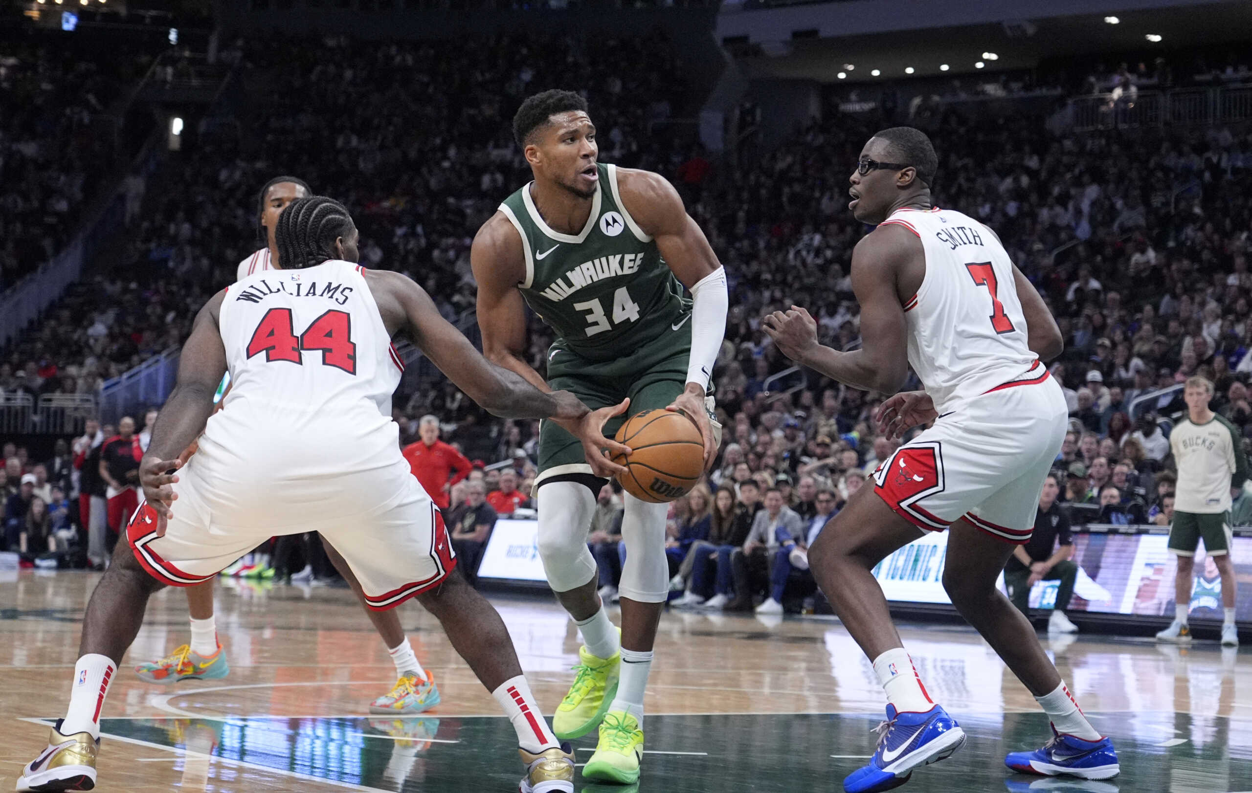 Oct 25, 2024; Milwaukee, Wisconsin, USA; Milwaukee Bucks forward Giannis Antetokounmpo (34) drives against Chicago Bulls forward Jalen Smith (7) and Chicago Bulls forward Patrick Williams (44) in the second half at Fiserv Forum. Mandatory Credit: Michael McLoone-Imagn Images