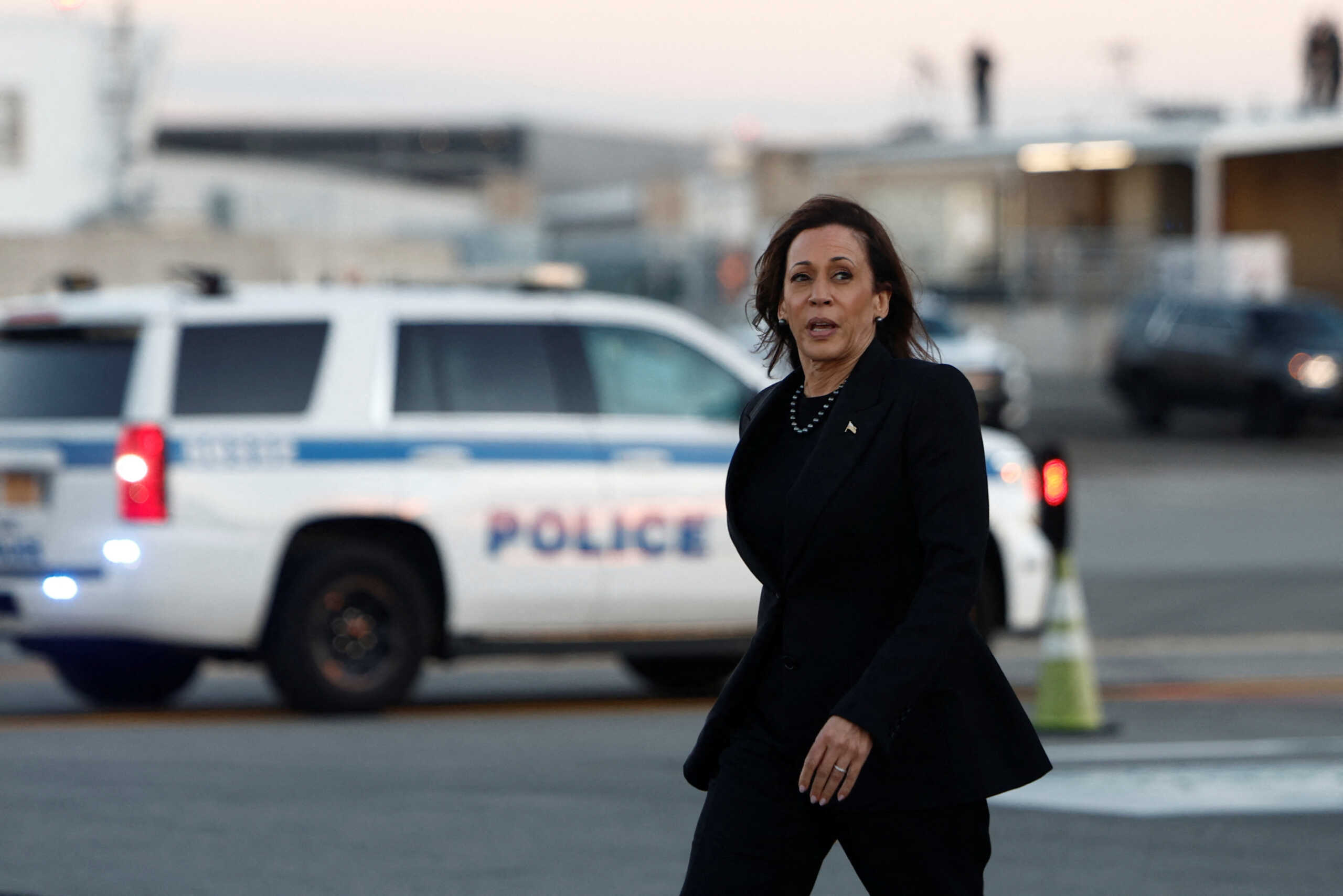 Democratic presidential nominee and U.S. Vice President Kamala Harris walks upon her arrival at LaGuardia Airport, in New York, U.S., October 7, 2024. REUTERS