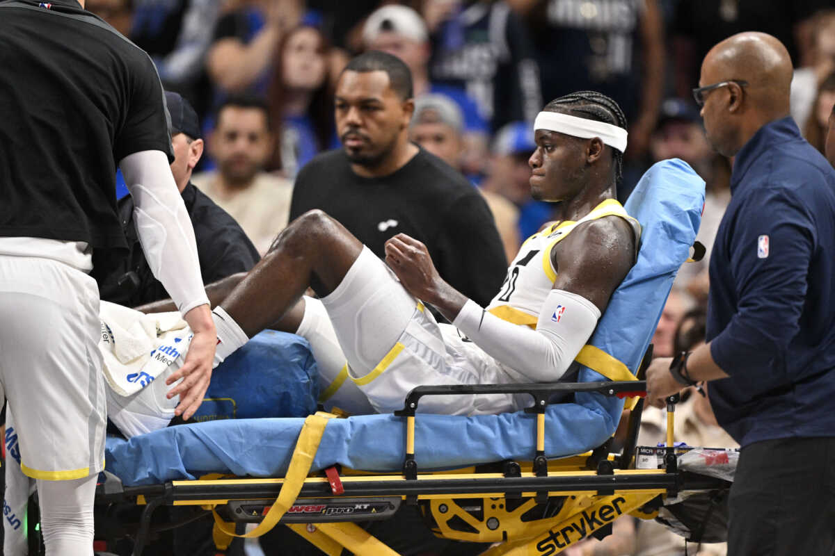 Oct 28, 2024; Dallas, Texas, USA; Utah Jazz forward Taylor Hendricks (0) is taken off the court after suffering a leg injury during the second half against the Dallas Mavericks at the American Airlines Center. Mandatory Credit: Jerome Miron-Imagn Images