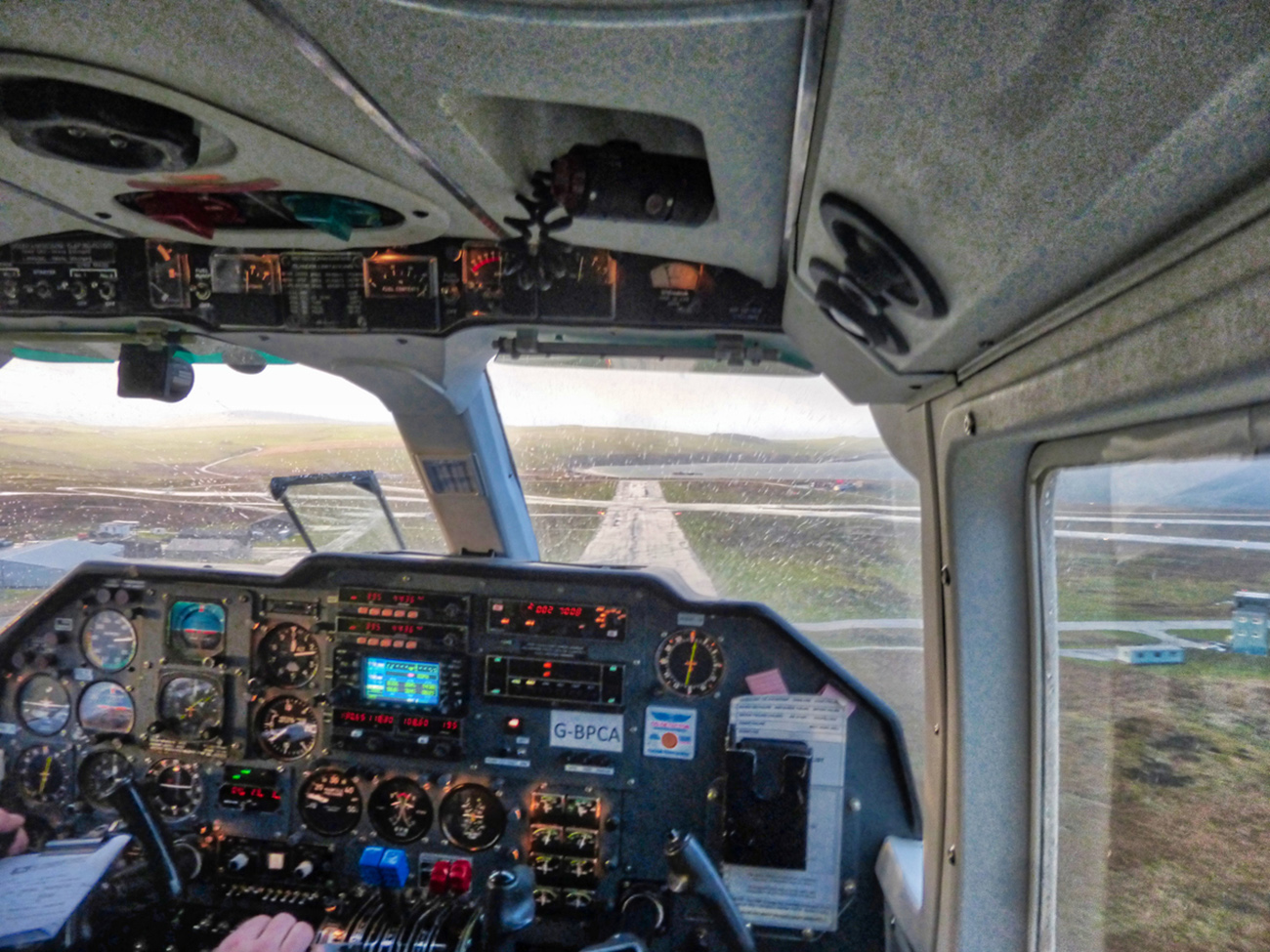 Orkney Island Scotland, Kirkwall Airport, 29 November 2017 From front row passenger seat looking over pilots shoulder in Islander 8 passenger aircraft to coming in to land on Kirkwall runway