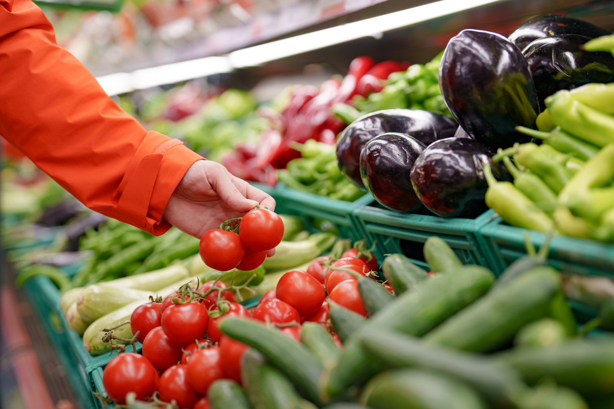 Man home shopping groceries in store