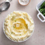 Mashed potatoes in a serving bowl, traditional side dish for every day dinner or celebration