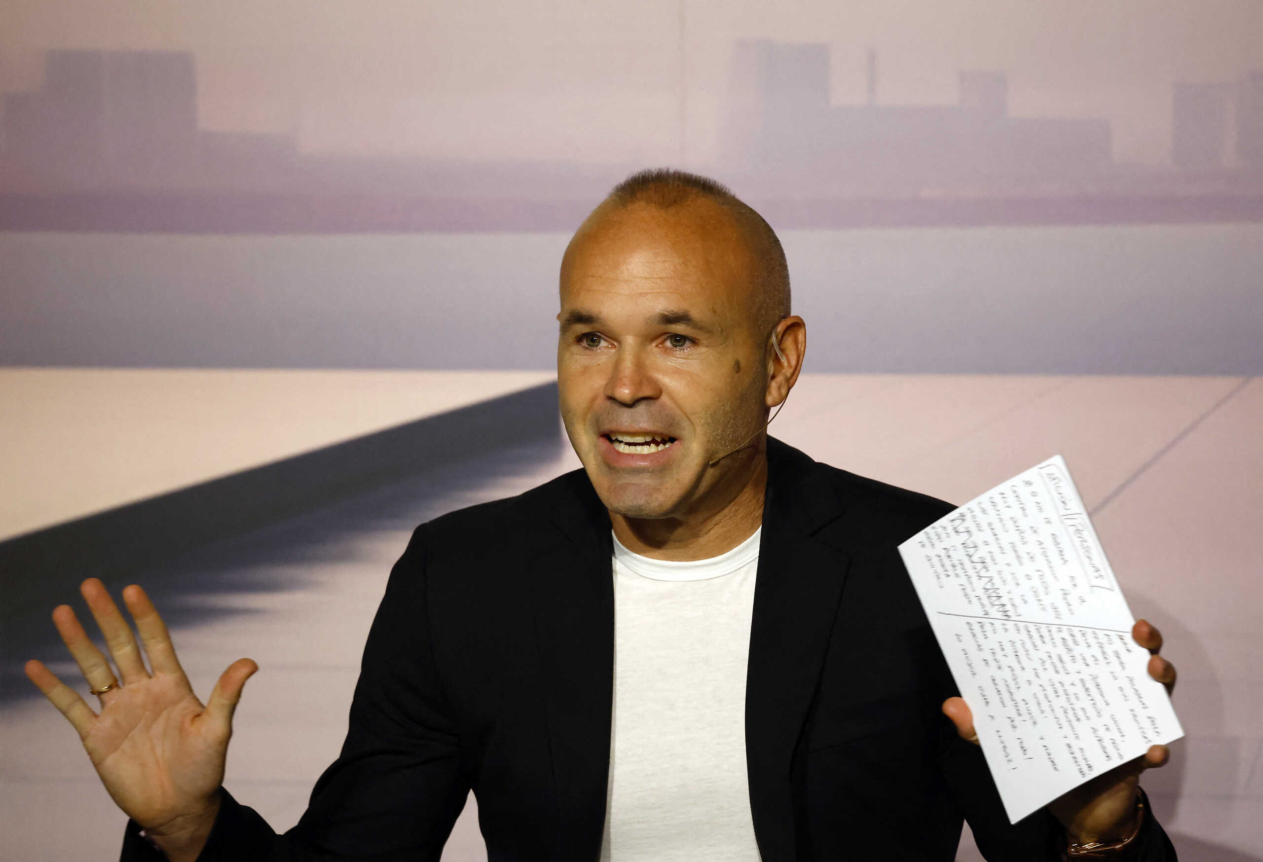Soccer Football - Andres Iniesta Press Conference - The Game Continues - Barcelona, Spain - October 8, 2024 Former Barcelona and Spain footballer Andres Iniesta reacts during a press conference REUTERS