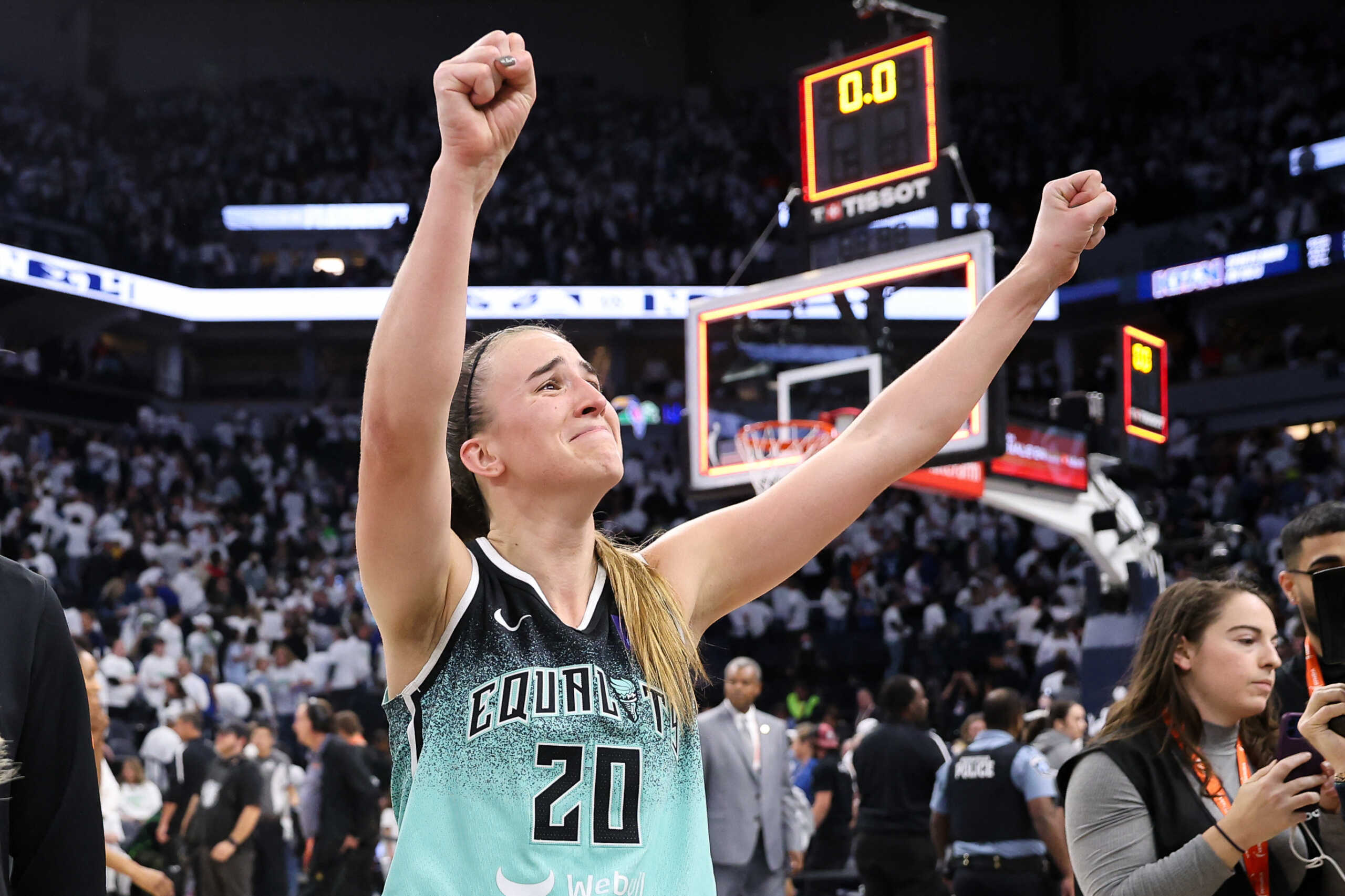Oct 16, 2024; Minneapolis, Minnesota, USA; New York Liberty guard Sabrina Ionescu (20) celebrates her teams win after game three of the 2024 NBA Finals against the Minnesota Lynx at Target Center. Mandatory Credit: Matt Krohn-Imagn Images