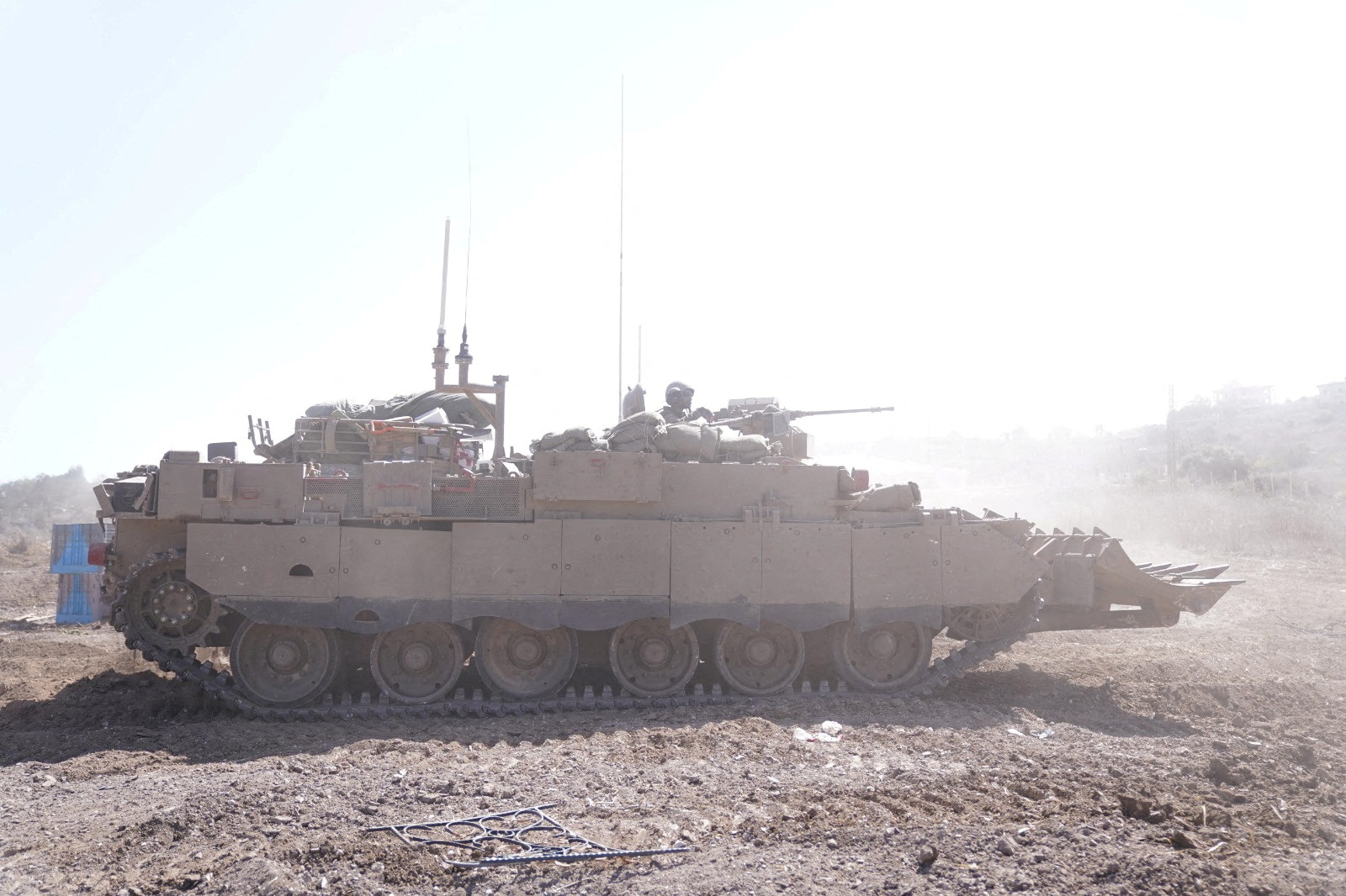 An Israeli armoured vehicle operates at a location given as Southern Lebanon in this image released on October 6, 2024. Israel Defense Forces