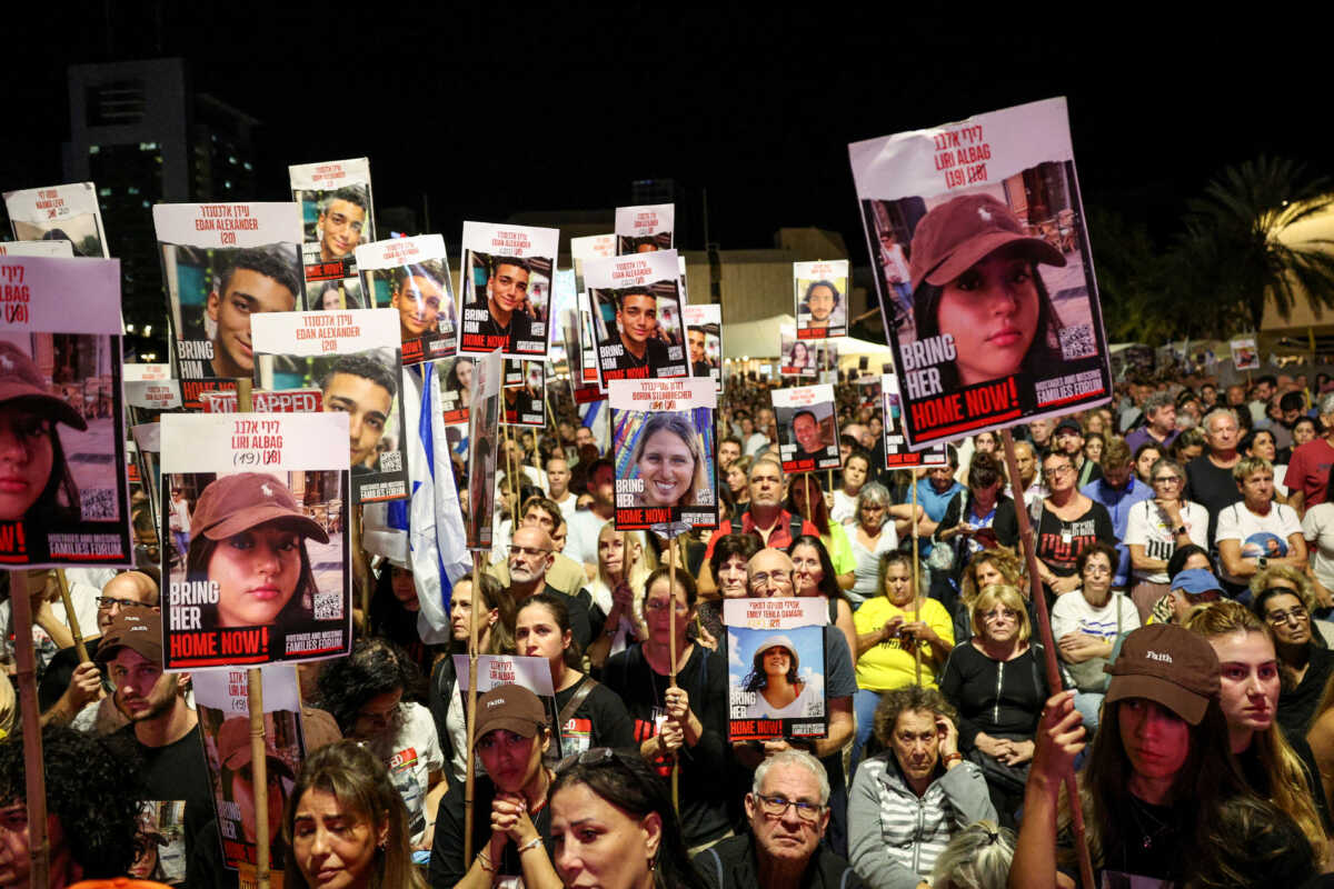 People attend a rally in support of hostages kidnapped during the deadly October 7, 2023 attack by Hamas, asking for their release, in Tel Aviv, Israel, October 19, 2024. REUTERS