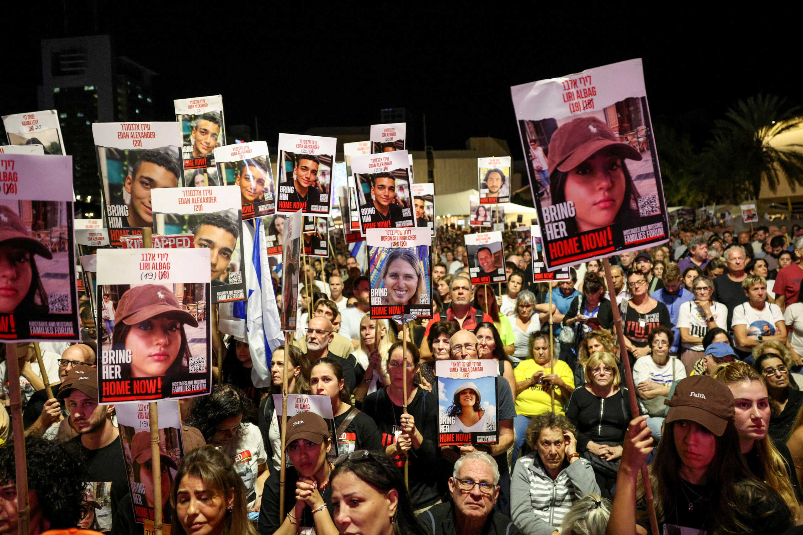 People attend a rally in support of hostages kidnapped during the deadly October 7, 2023 attack by Hamas, asking for their release, in Tel Aviv, Israel, October 19, 2024. REUTERS