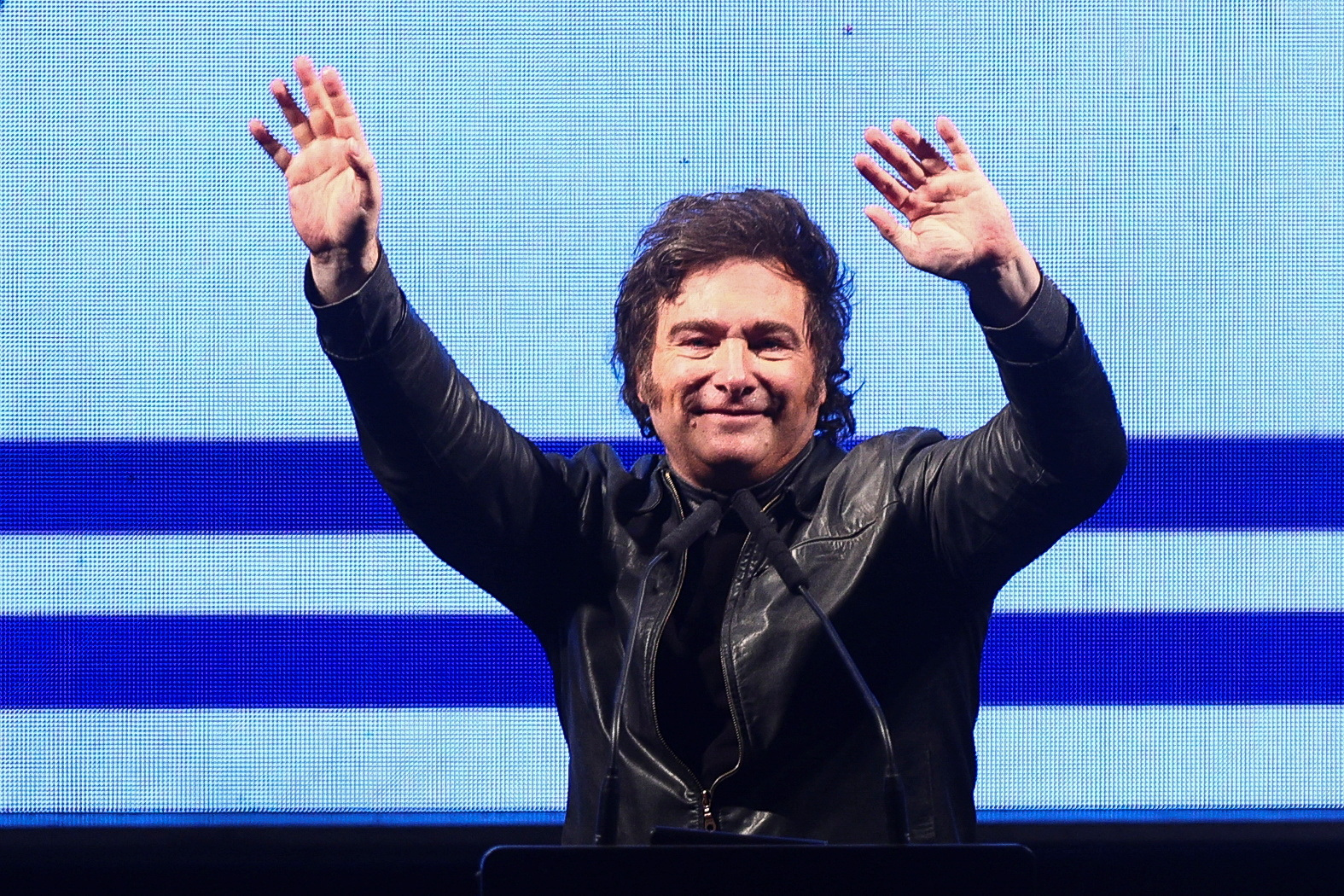 Argentina's President Javier Milei gestures onstage during a rally to launch his party, La Libertad Avanza, nationally, in Buenos Aires, Argentina September 28, 2024. REUTERS
