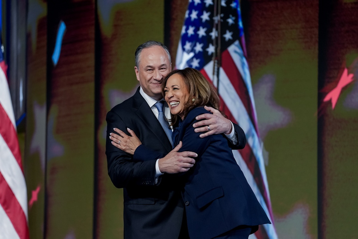 epa11561037 Democratic presidential nominee and US Vice President Kamala Harris (R) and her husband Second Gentleman Doug Emhoff (L) embrace on stage after she spoke during the final night of the Democratic National Convention (DNC) at the United Center in Chicago, Illinois, USA, 22 August, 2024. The 2024 Democratic National Convention is being held from 19 to 22 August 2024, during which delegates of the United States' Democratic Party will vote on the party's platform and ceremonially vote for the party's nominee for president, Vice President Kamala Harris, and for vice president, Governor Tim Walz of Minnesota, for the upcoming presidential election.  EPA