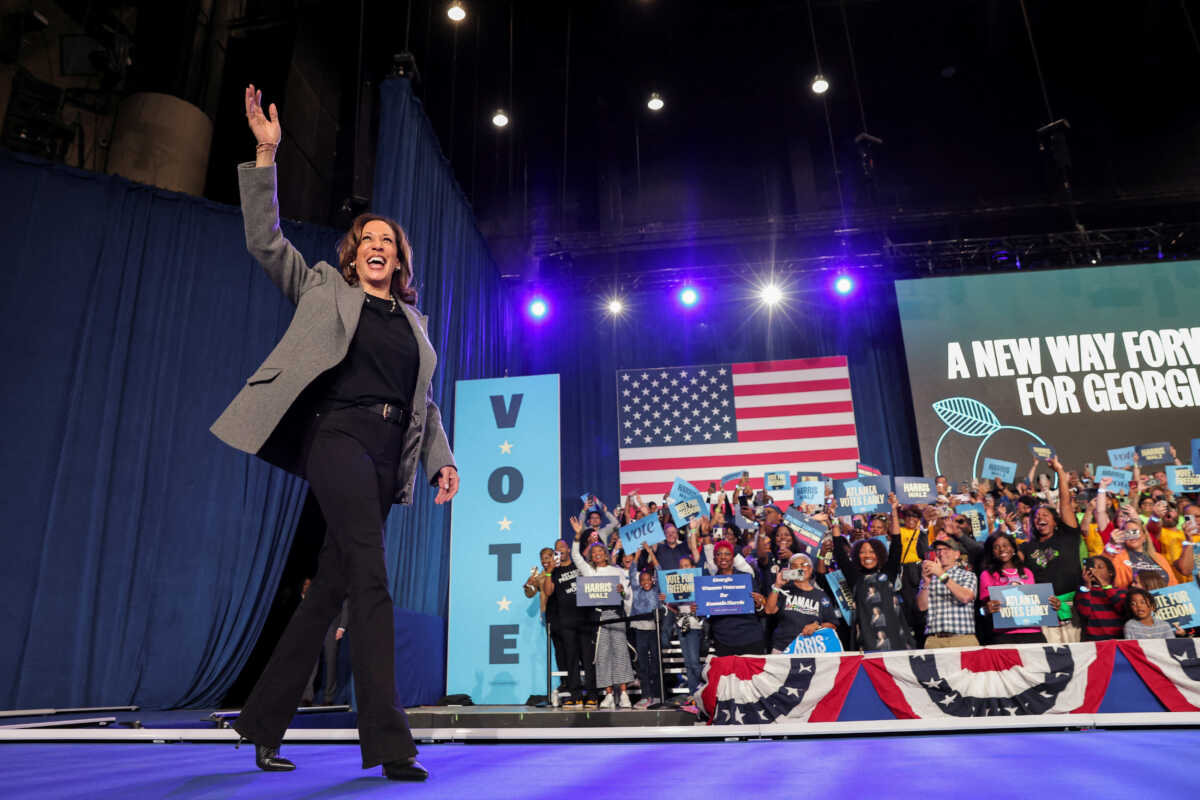 Democratic presidential nominee and U.S. Vice President Kamala Harris waves during a campaign event in Atlanta, Georgia, U.S., October 19, 2024. REUTERS