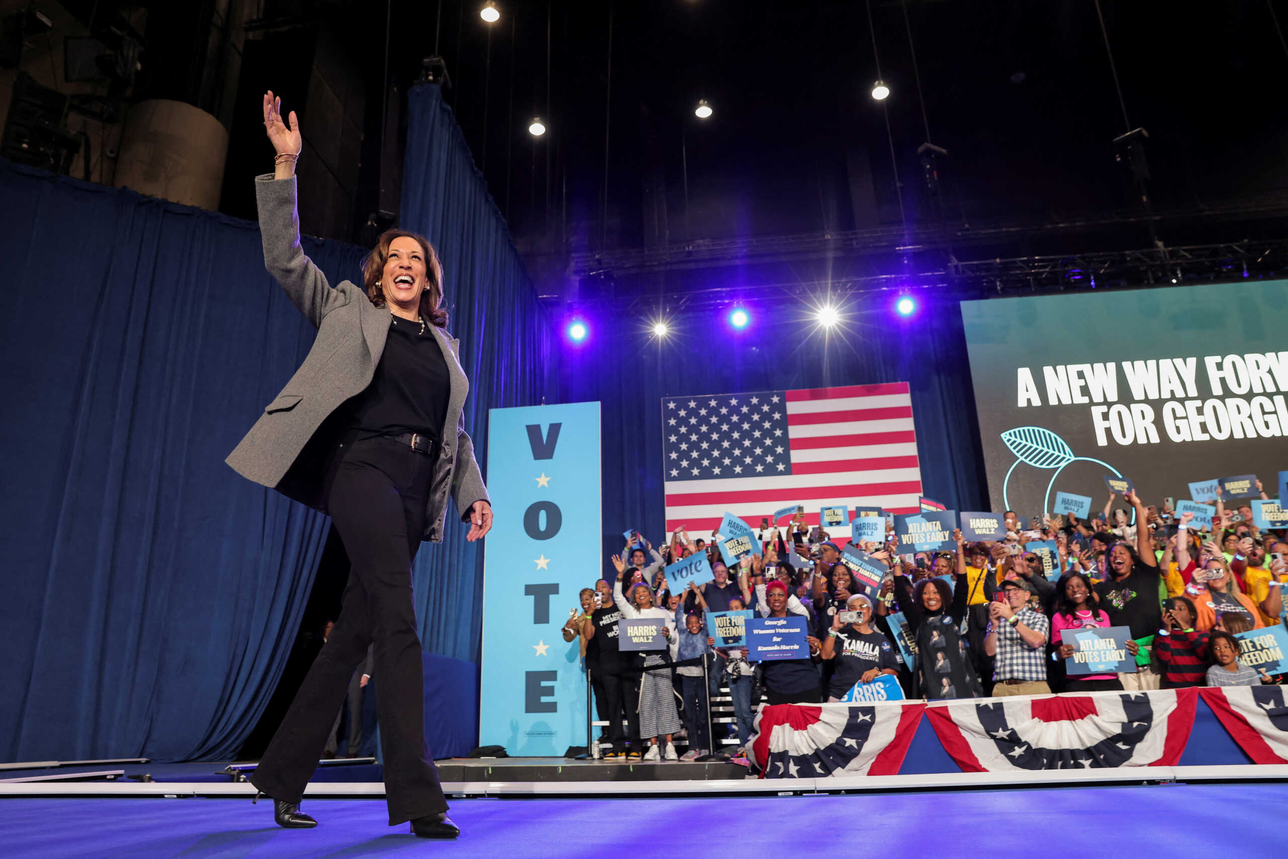 Democratic presidential nominee and U.S. Vice President Kamala Harris waves during a campaign event in Atlanta, Georgia, U.S., October 19, 2024. REUTERS