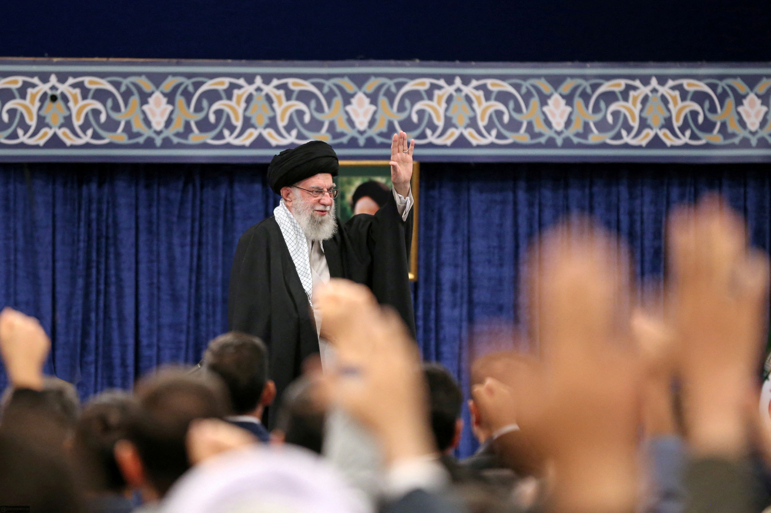 Iran's Supreme Leader Ayatollah Ali Khamenei waves during a meeting in Tehran, Iran, October 2, 2024. Office of the Iranian Supreme Leader