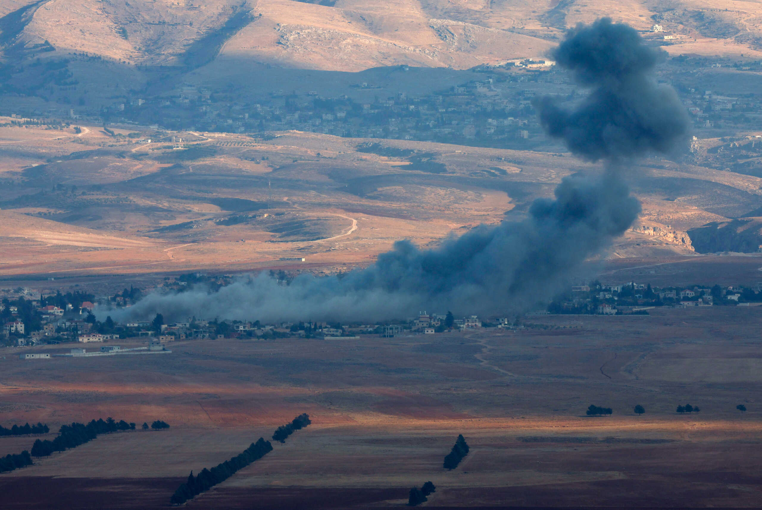 Smoke rises after an Israeli strike on Maqne town in Lebanon's Baalbek region as seen from Deir Al-Ahmar, amid ongoing hostilities between Hezbollah and Israeli forces, October 31, 2024. REUTERS