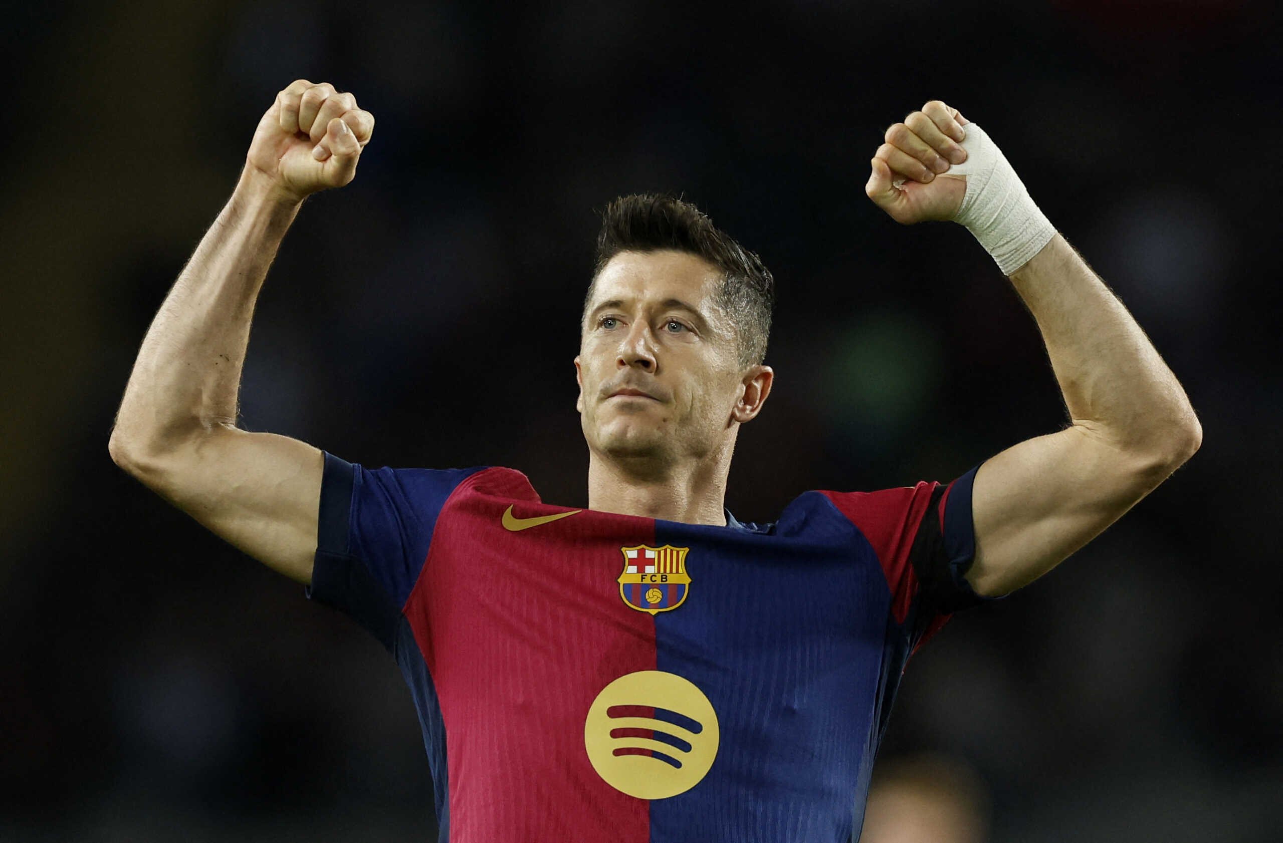 Soccer Football - LaLiga - FC Barcelona v Sevilla - Estadi Olimpic Lluis Companys, Barcelona, Spain - October 20, 2024 FC Barcelona's Robert Lewandowski celebrates scoring their first goal REUTERS