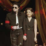FILE - Michael Jackson and Lisa Marie Presley-Jackson acknowledge applause from the audience after coming out onstage to open the 11th annual MTV Video Music Awards at New York's Radio City Music Hall, Sept. 8, 1994. Presley, singer and only child of Elvis, died Thursday, Jan. 12, 2023, after a hospitalization, according to her mother, Priscilla Presley. She was 54. (AP Photo