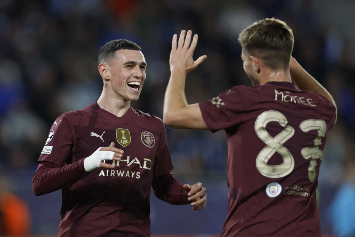 Soccer Football - Champions League - Slovan Bratislava v Manchester City - Tehelne pole, Bratislava, Slovakia - October 1, 2024  Manchester City's James McAtee celebrates scoring their fourth goal with Phil Foden REUTERS