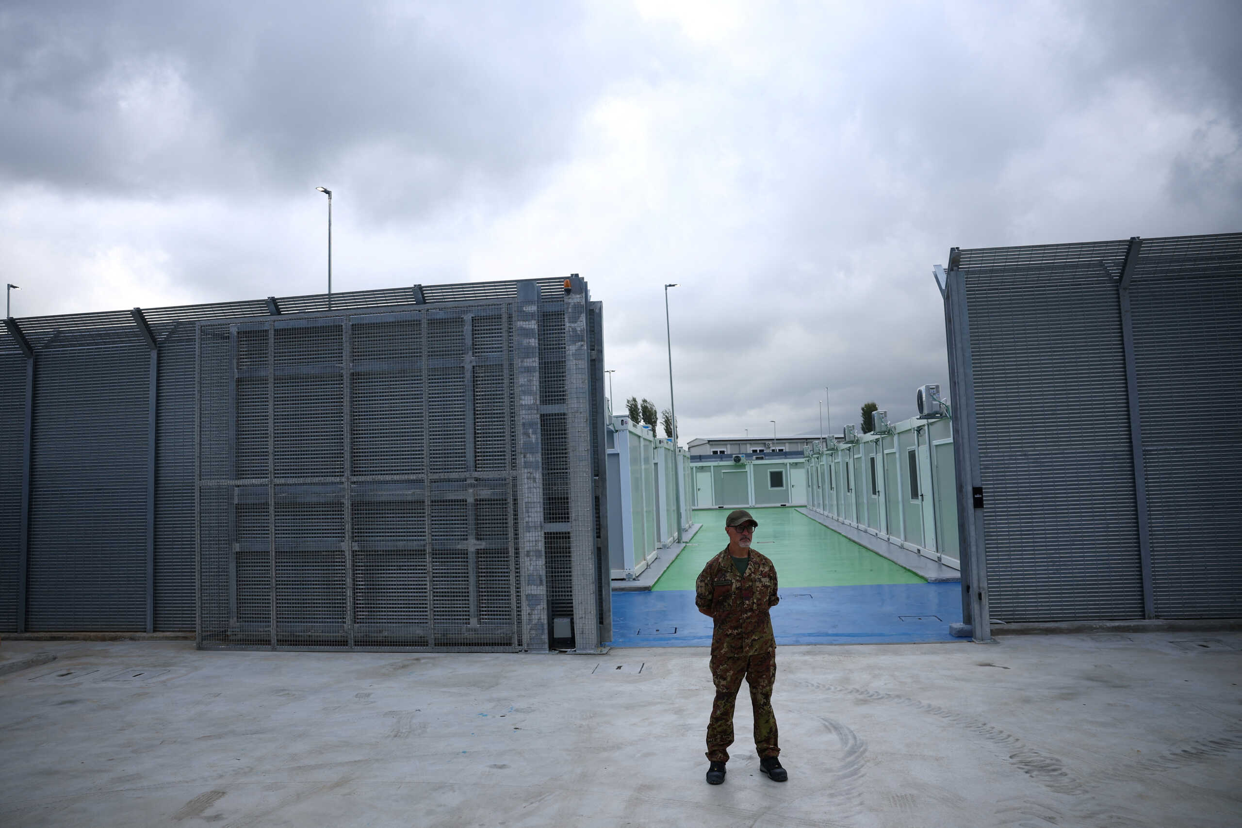 A member of Italian Army stands at a camp for illegal migrants in Gjader, Albania October 11, 2024.