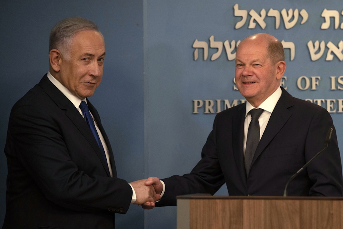 epa11226389 Israeli Prime Minister Benjamin Netanyahu (L) shakes hands with German Chancellor Olaf Scholz (R) at a press conference following their meeting in Jerusalem, 17 March 2024. During a joint press statement with the Israeli Prime Minister, Chancellor Scholz called for increased humanitarian aid for Palestinians in the Gaza Strip.  EPA