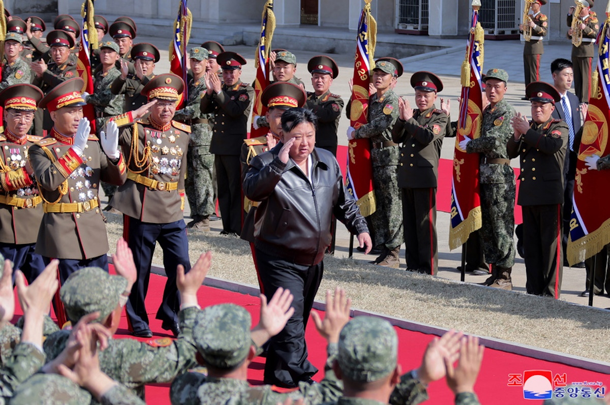epa11242196 A photo released by the official North Korean Central News Agency (KCNA) shows North Korean leader Kim Jong Un (C) inspecting the headquarters of the Seoul Ryu Kyong Su Guards 105th Tank Division of the Korean People's Army (KPA) and the First Tank Armored Infantry Regiment at an undisclosed location in North Korea, 24 March 2024 (issued 25 March 2024). According to KCNA, North Korean leader Kim Jong Un examined combat documents and 'indicated the operational combat tasks and orientation of combat training of the combined units' after being briefed on the division's plan for offensive and defensive operations by its commander.  EPA