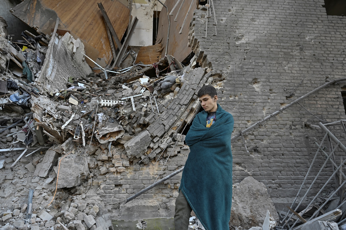 Vladyslav, 14, stands next to his apartment destroyed by a Russian air strike, amid Russia's attack on Ukraine, in Zaporizhzhia, Ukraine September 29, 2024. REUTERS