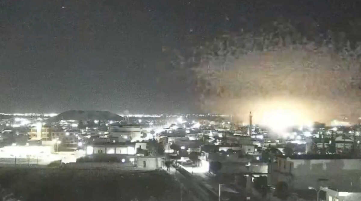 A view shows explosion among buildings in Tal Rifaat, Aleppo Governorate, Syria in this screen grab from a CCTV footage obtained from a social media video released on October 24, 2024. Social Media
