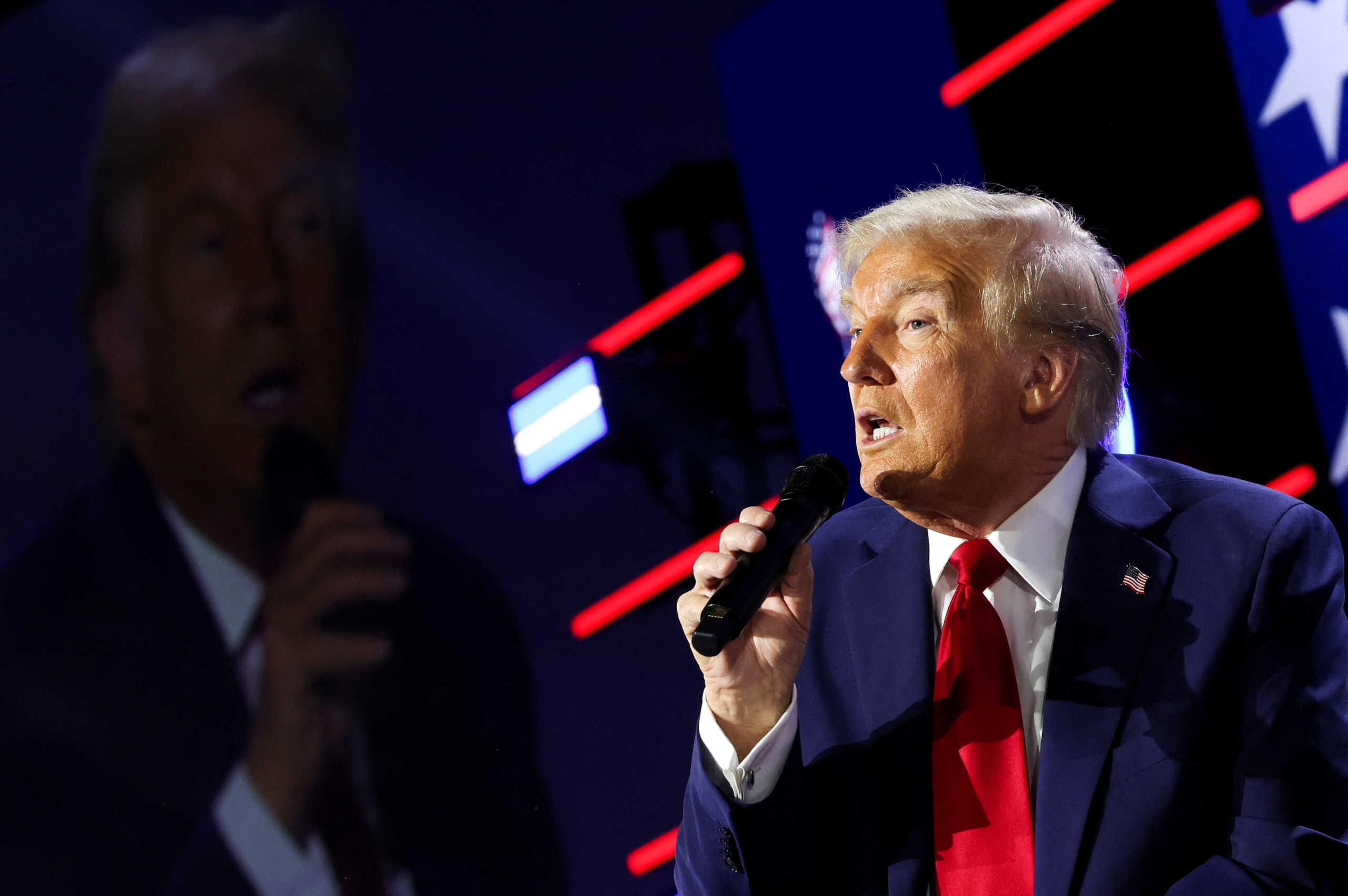 Republican presidential nominee former U.S. President Donald Trump participates in a moderated Q&A with Pastor Paula White (not pictured), at the National Faith Advisory Summit, in Powder Springs, Georgia, U.S., October 28, 2024. REUTERS