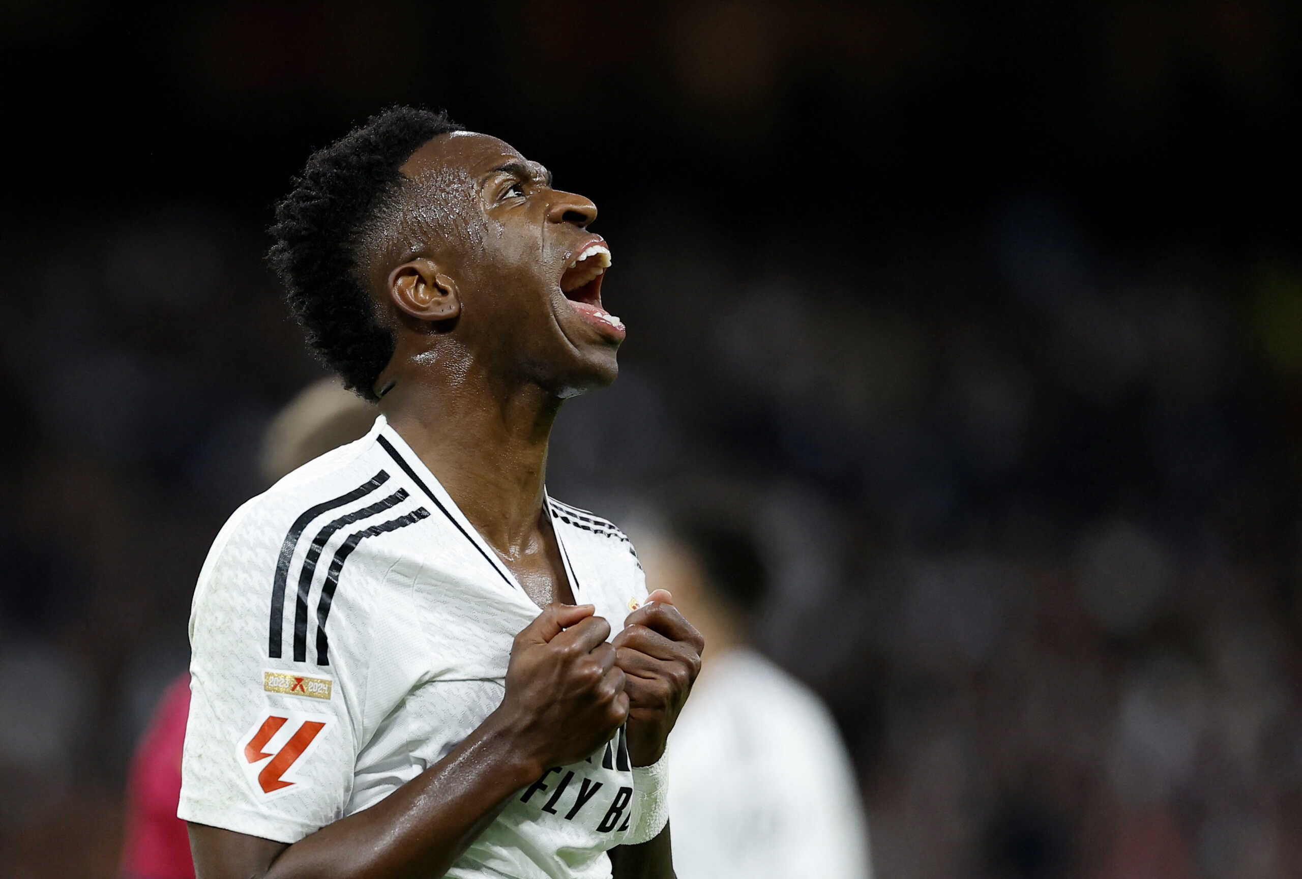 Soccer Football - LaLiga - Real Madrid v FC Barcelona - Santiago Bernabeu, Madrid, Spain - October 26, 2024 Real Madrid's Vinicius Junior reacts REUTERS