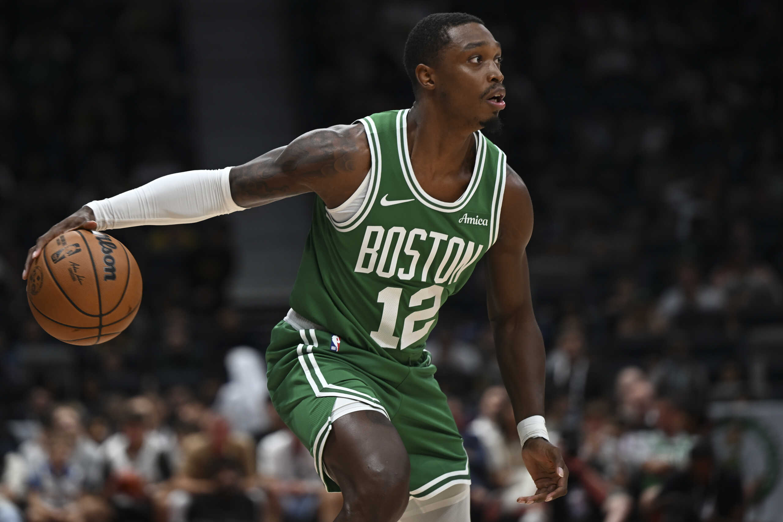Boston Celtics Lonnie Walker IV in action during a preseason game between Boston Celtics and Denver Nuggets in Abu Dhabi, United Arab Emirates, Friday, Oct. 4, 2024. (AP Photo