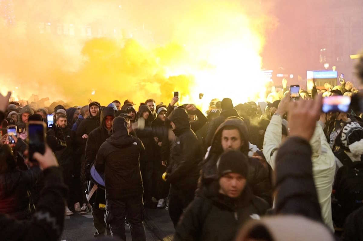 Israeli Maccabi Tel Aviv supporters demonstrate and light flares in Amsterdam, Netherlands, November 7, 2024, in this screengrab obtained from a social media video.  Michel Van Bergen