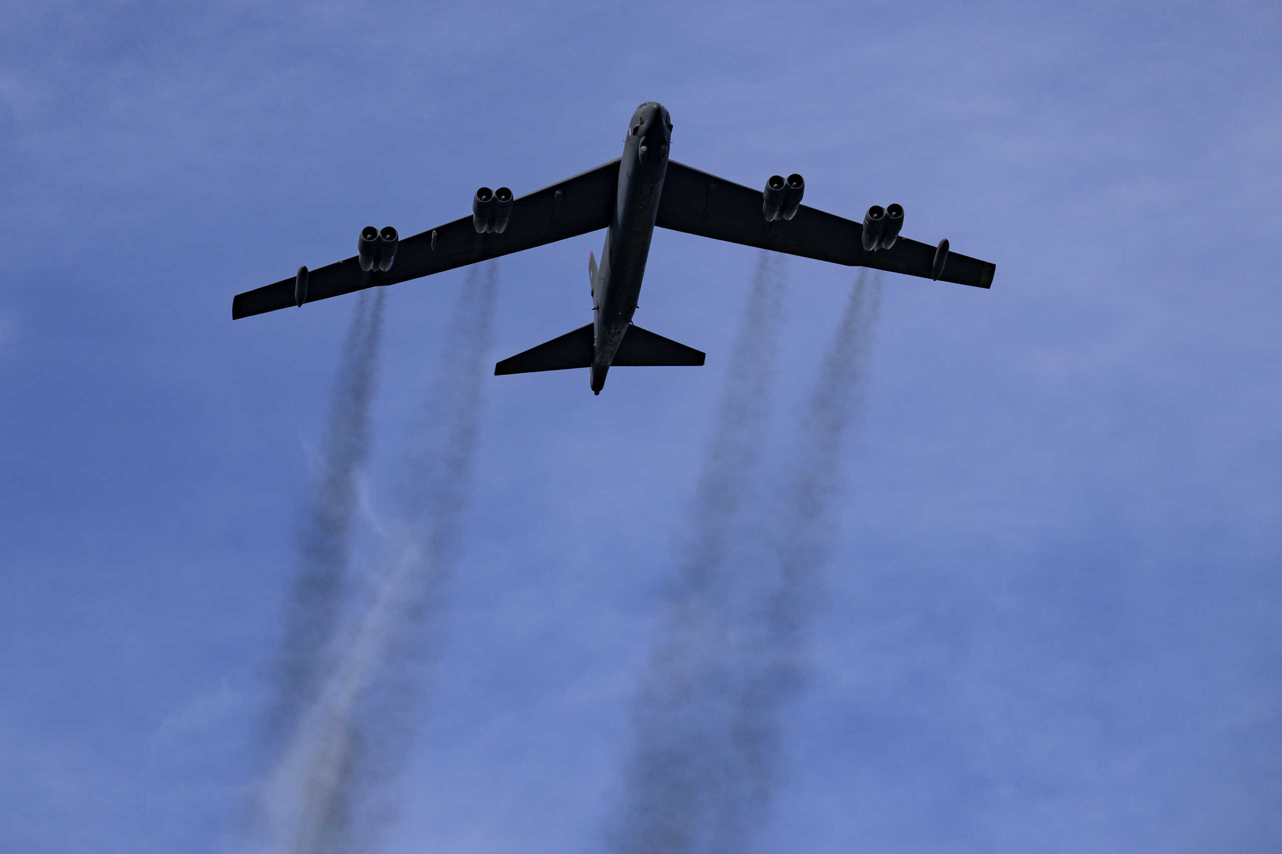 A B-52 jet from nearby Barksdale Air Force Base flies over during the playing of the national anthem before the start of the Independence Bowl NCAA football game between Louisiana-Lafayette and Houston in Shreveport, La. Friday, Dec. 23, 2022. (AP Photo